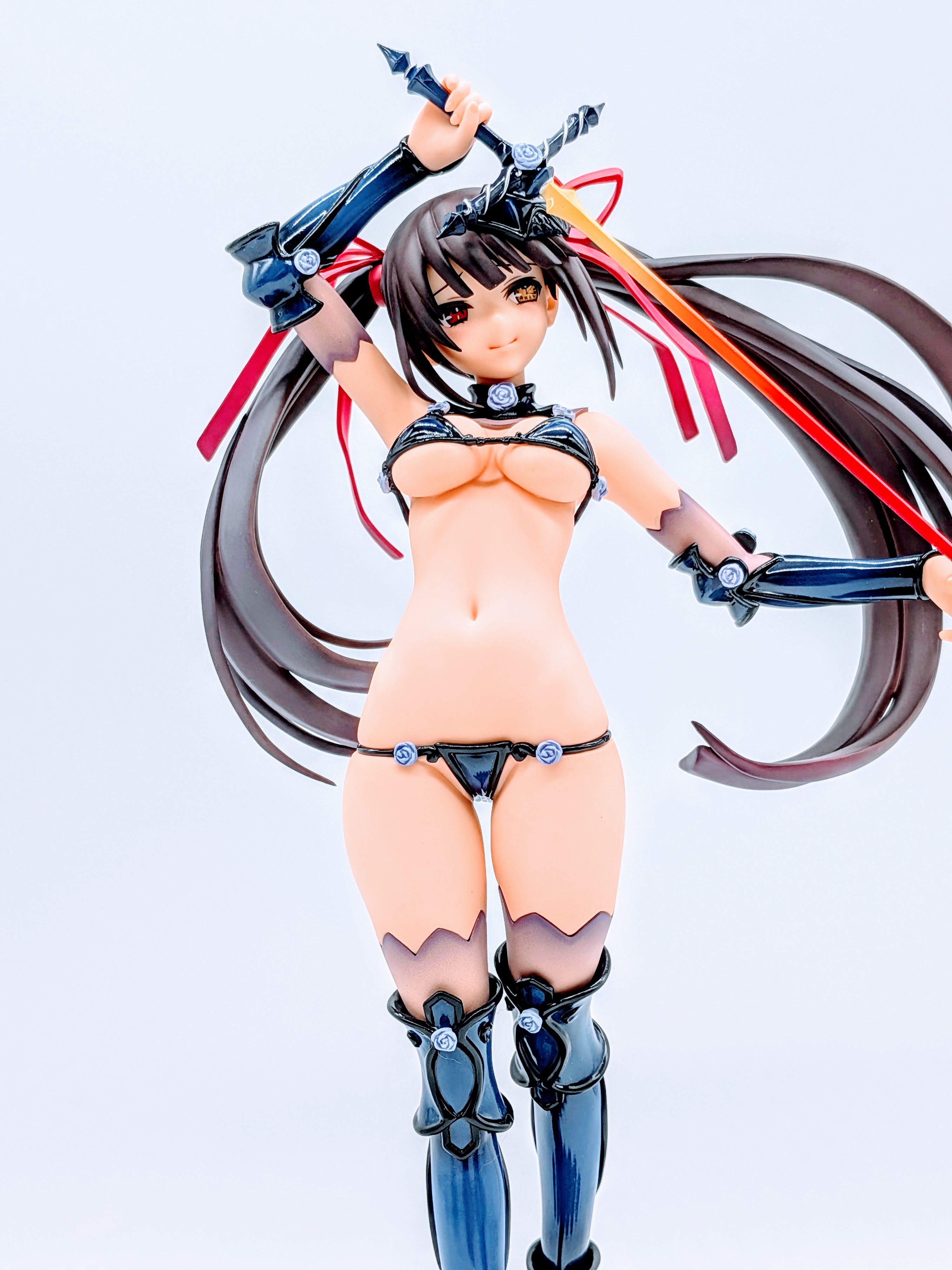 Kurumi Tokisaki low-angle front emphasizing armor and legs