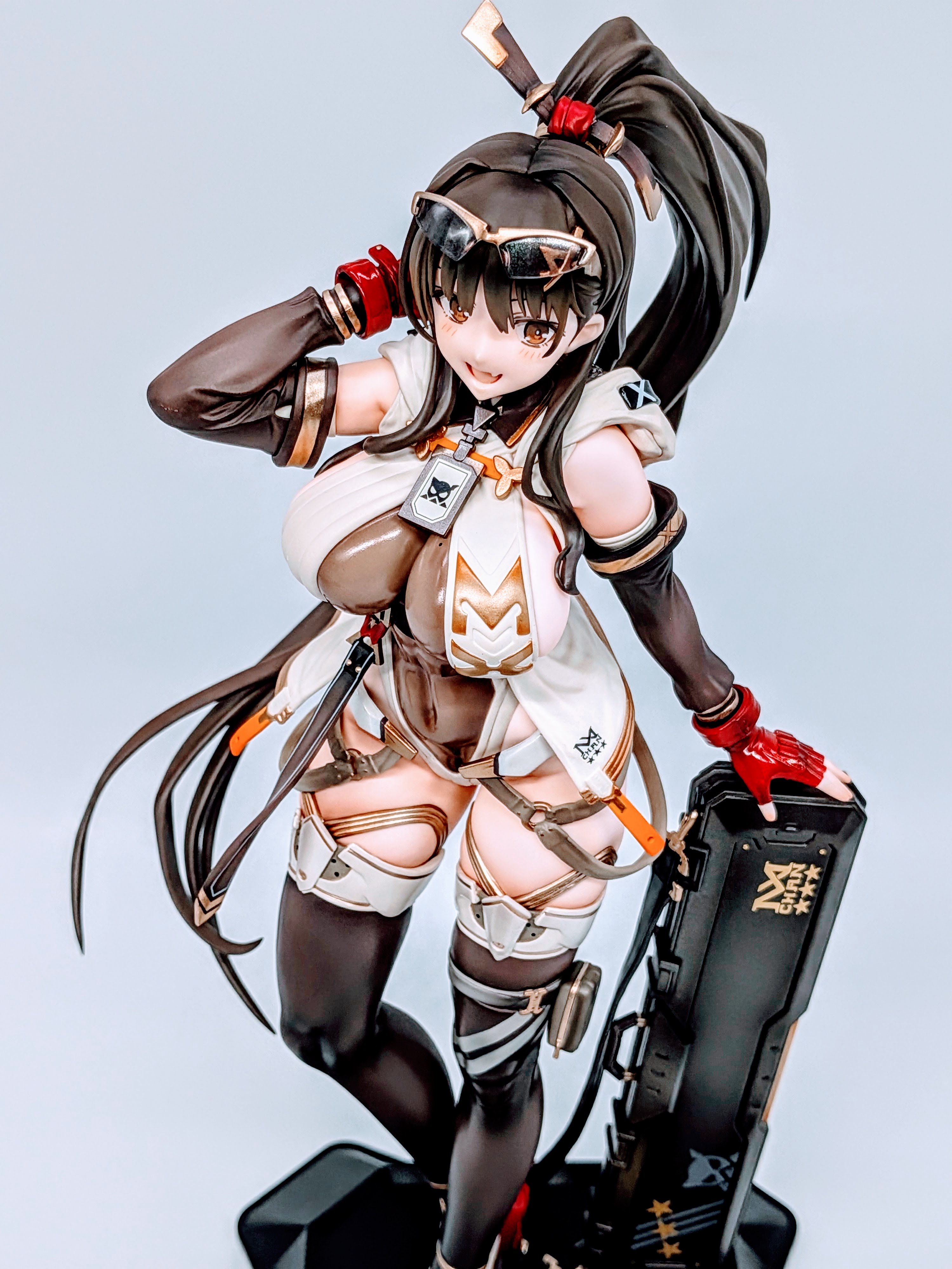 Front close-up of MX-chan showing chest armor and glossy stockings