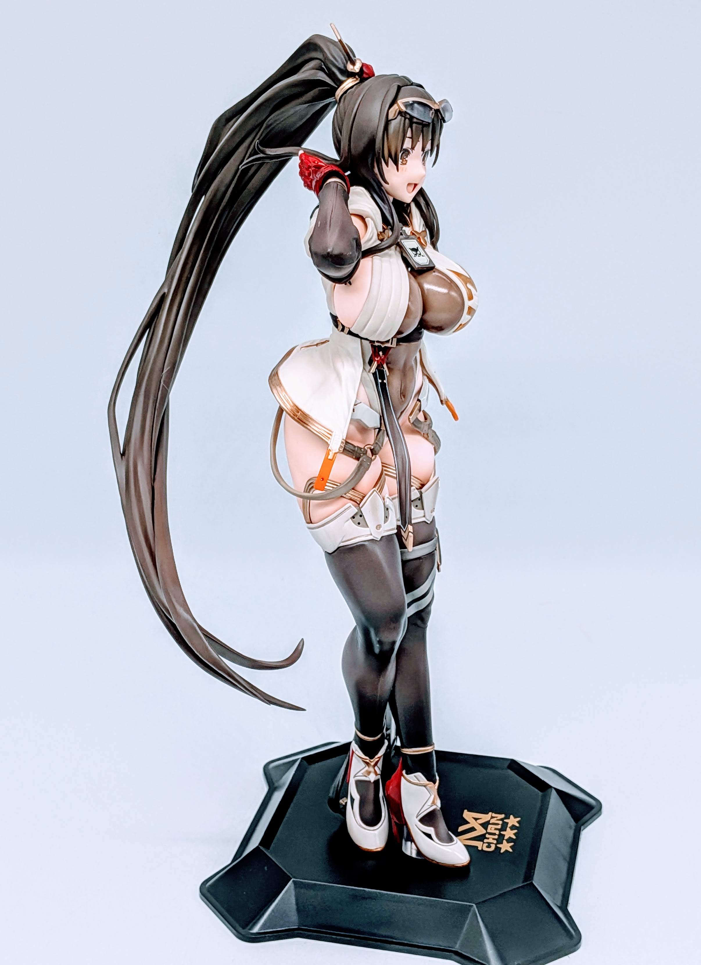 Left side full-body view of MX-chan figure showing legs and mechanical base