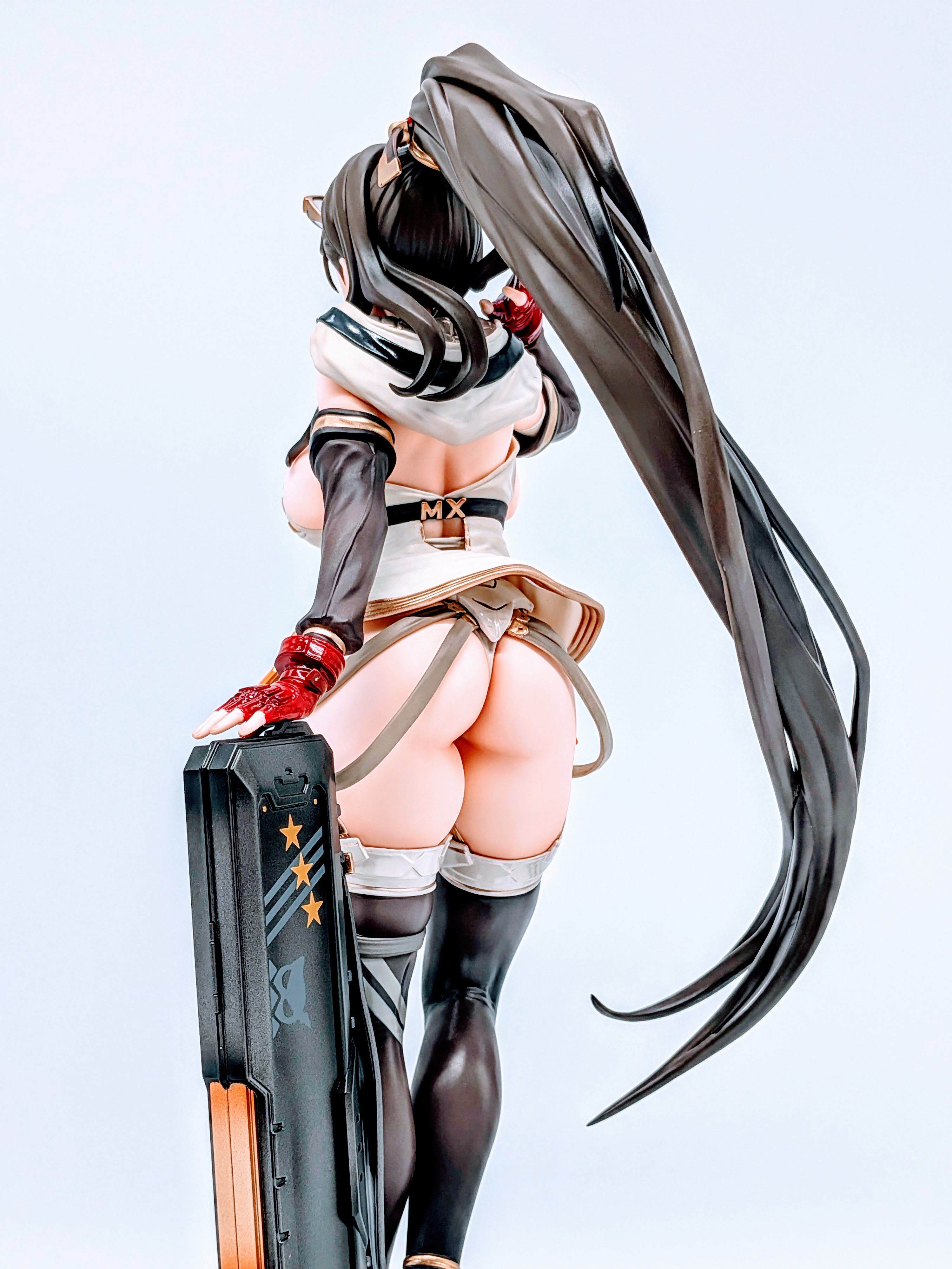 Three-quarter back view of MX-chan figure