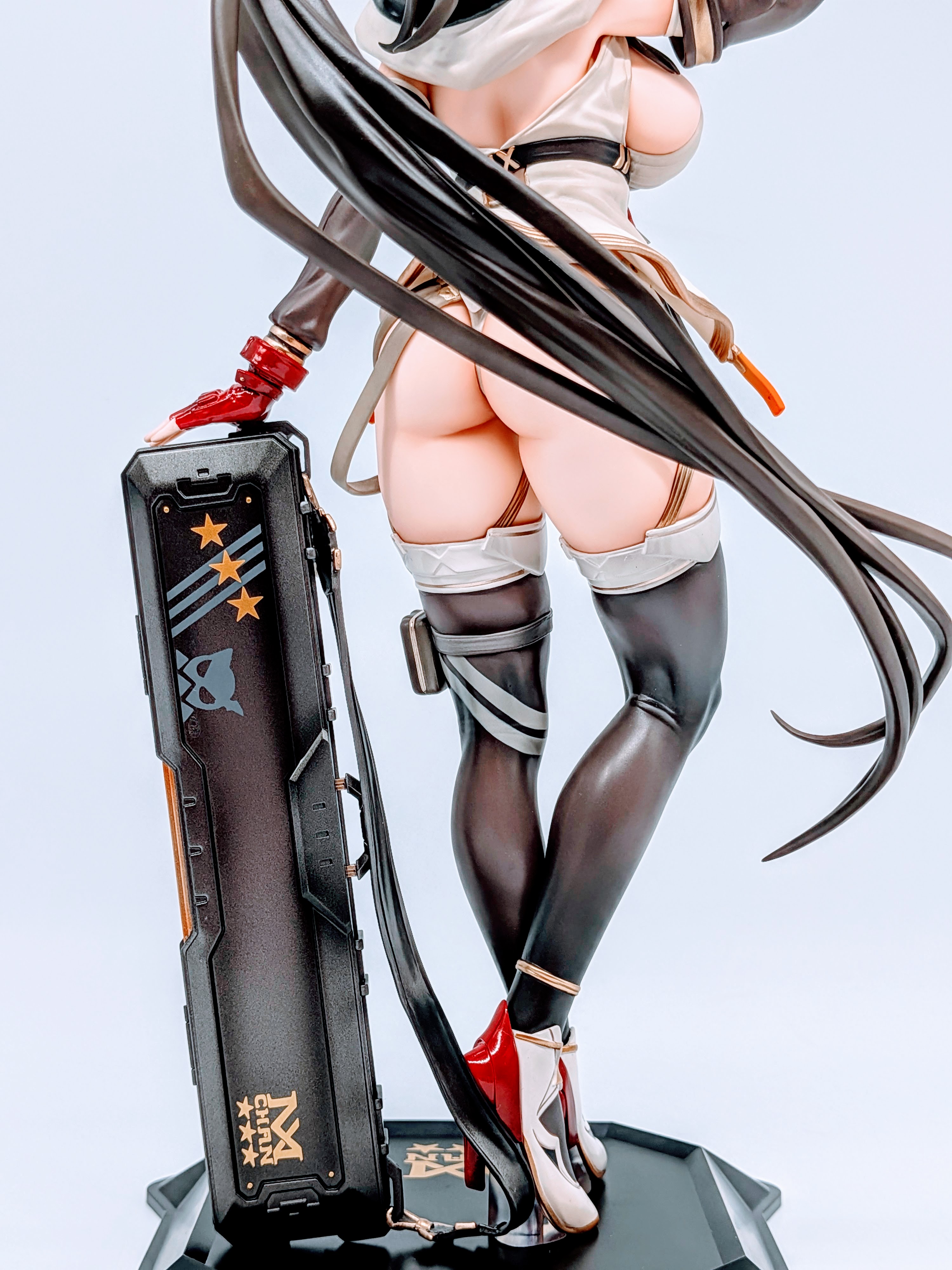 Back close-up of MX-chan figure focusing on hair and shoulder armor