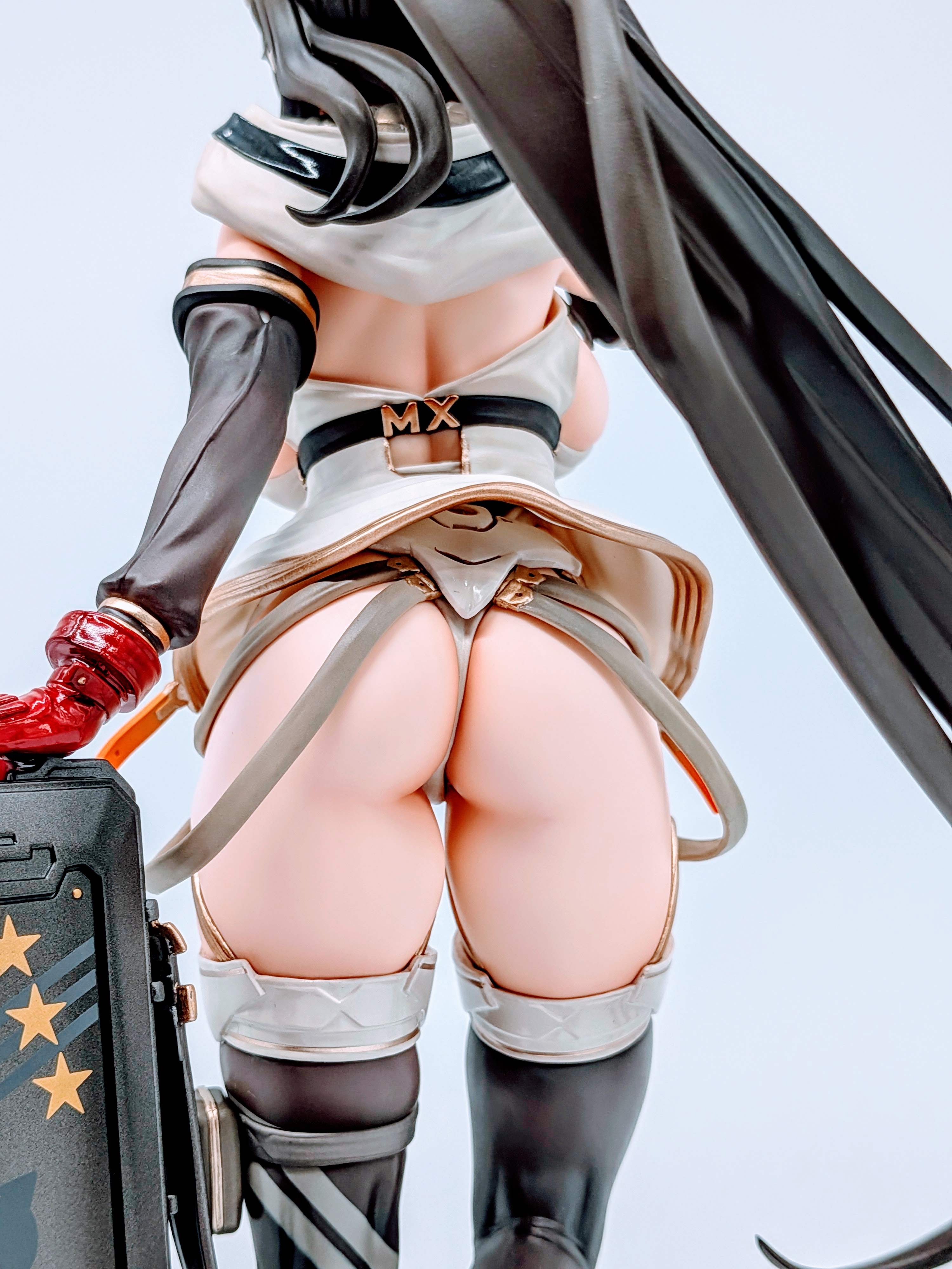 Close-up of MX-chan hips and thighs in glossy black stockings