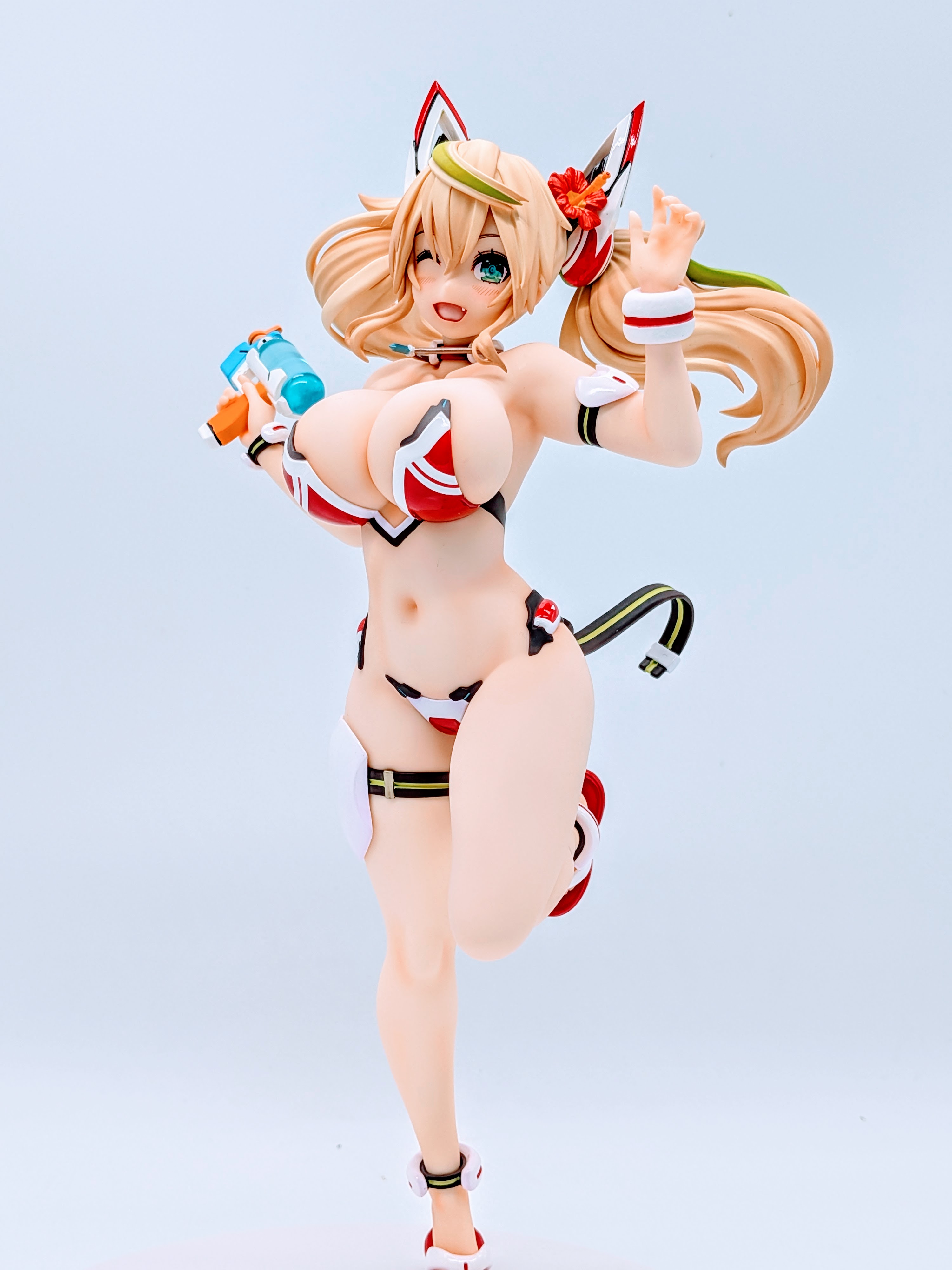 Close-up of Sunshine Gene hips and upper thighs in swimsuit