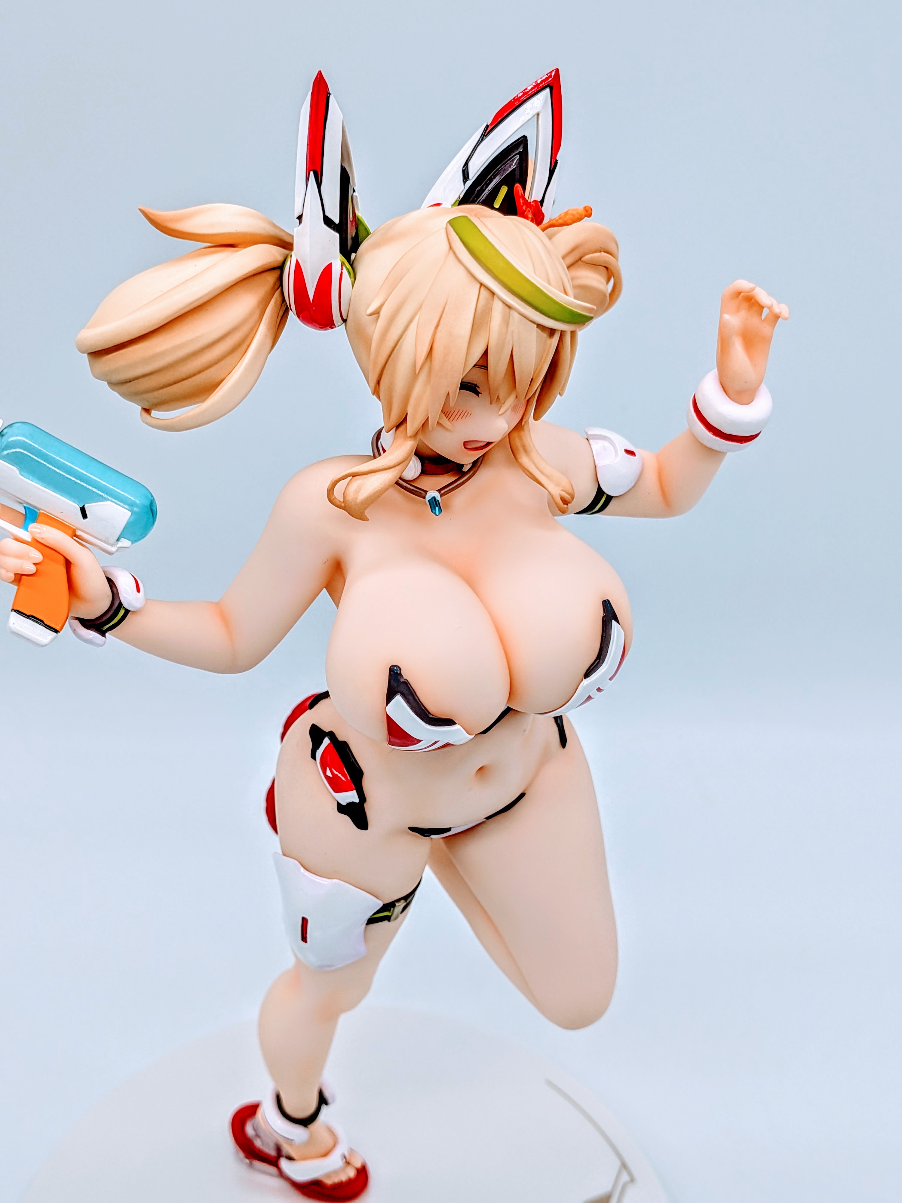 Side close-up of Sunshine Gene upper body and big bikini-covered bust