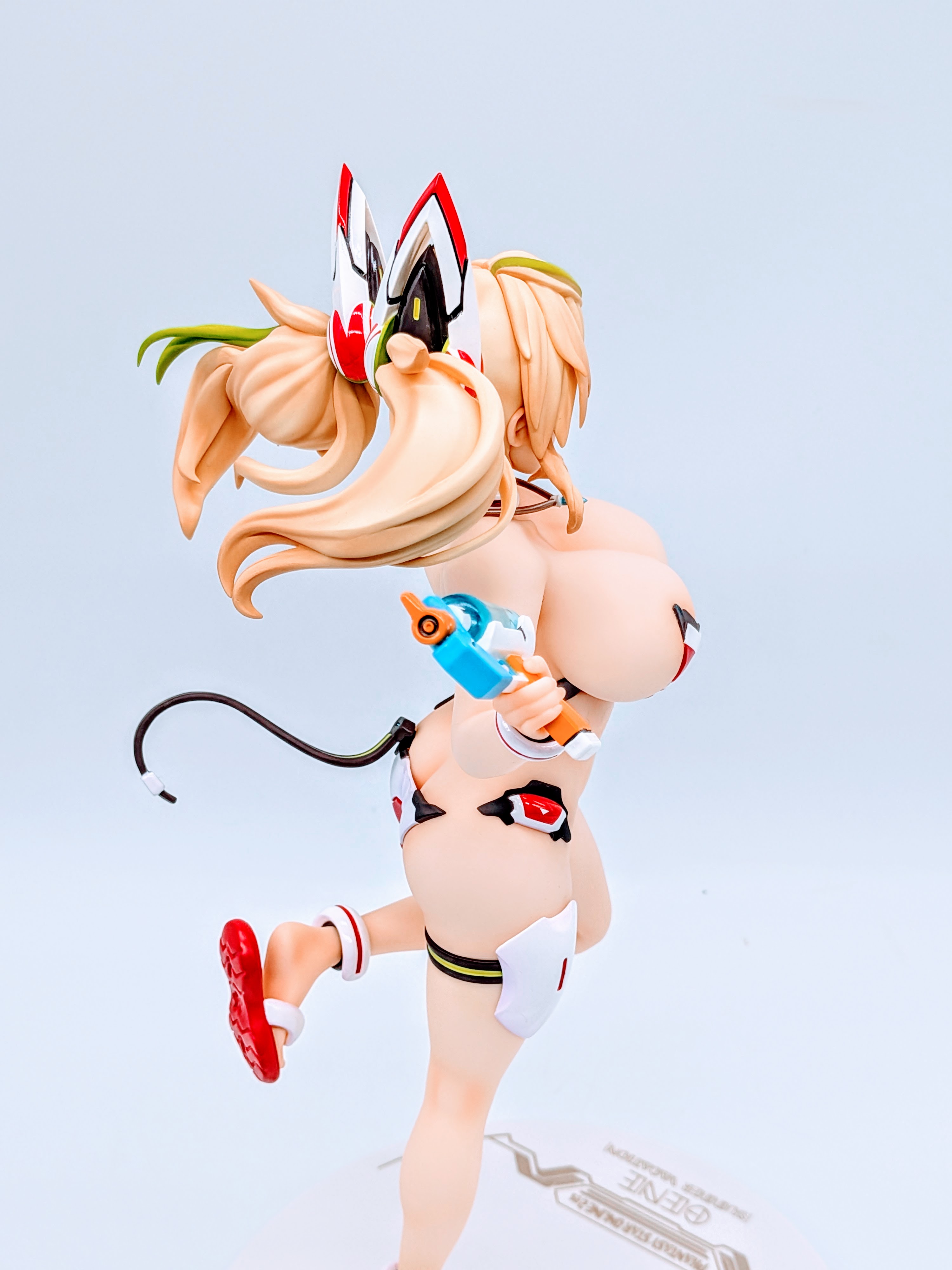 Side close-up of Sunshine Gene thighs and hips in swimsuit