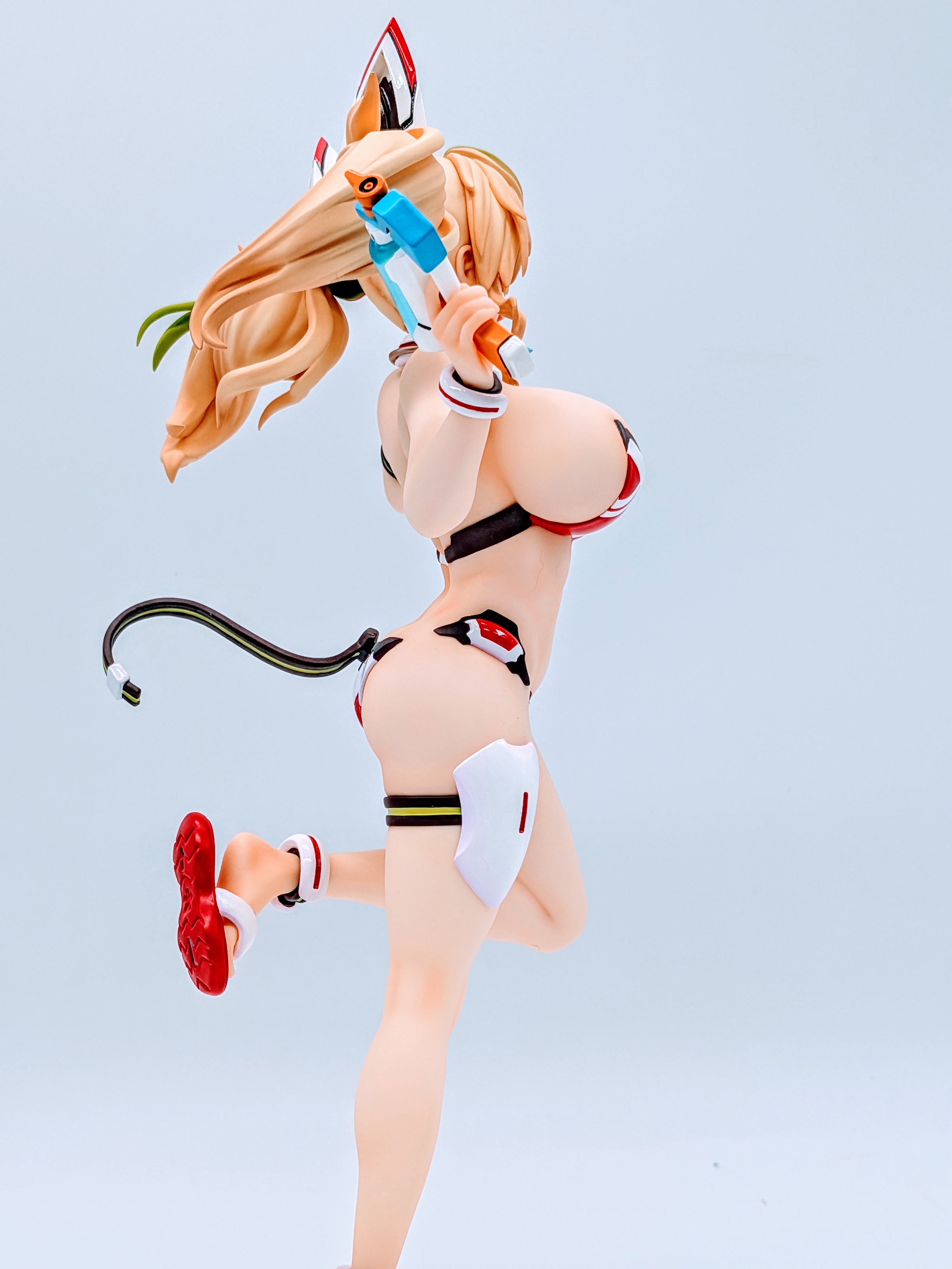 Side close-up of Sunshine Gene swimsuit ribbon and waist