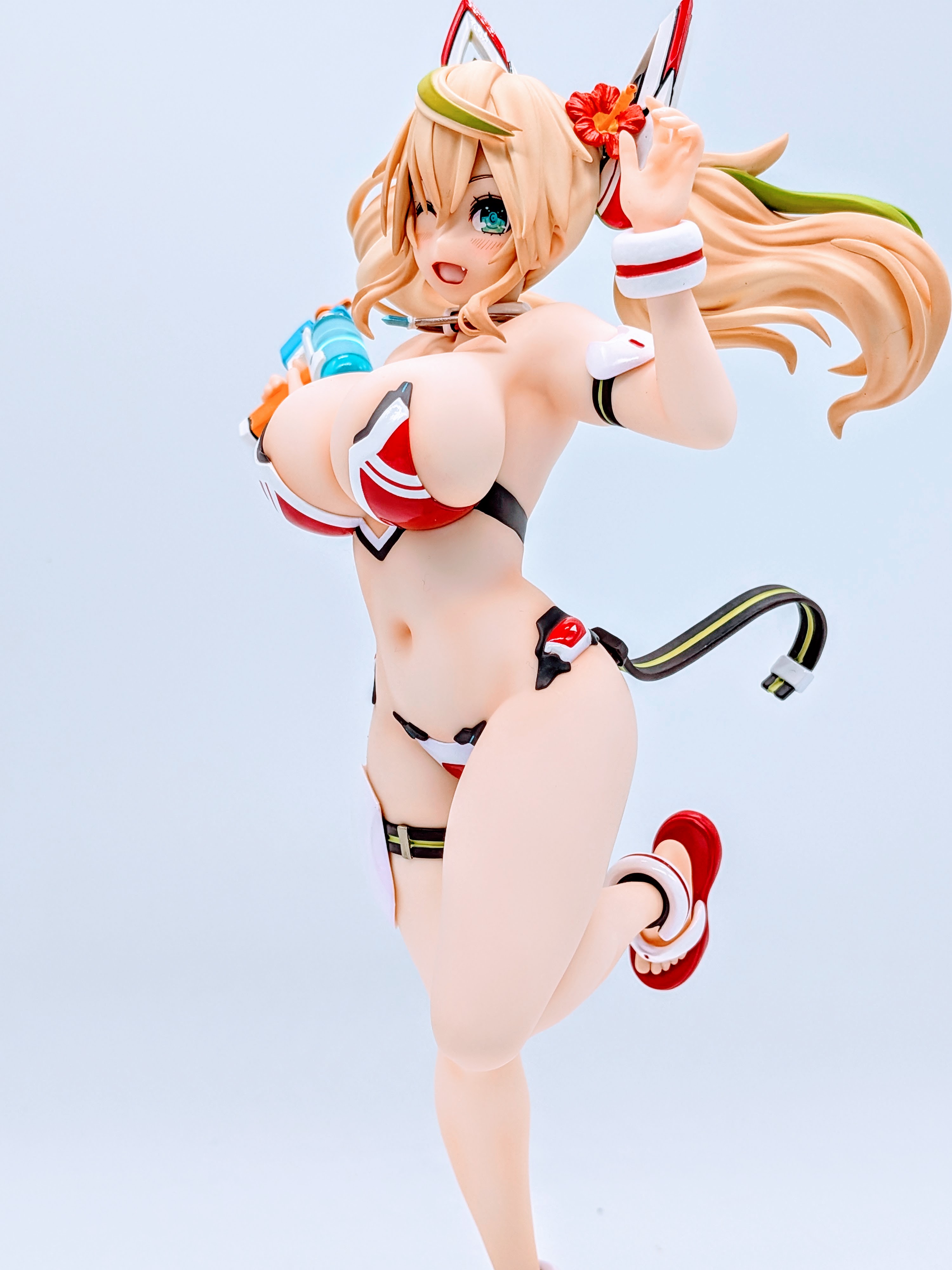 Side angle of Sunshine Gene figure capturing entire body and clear base