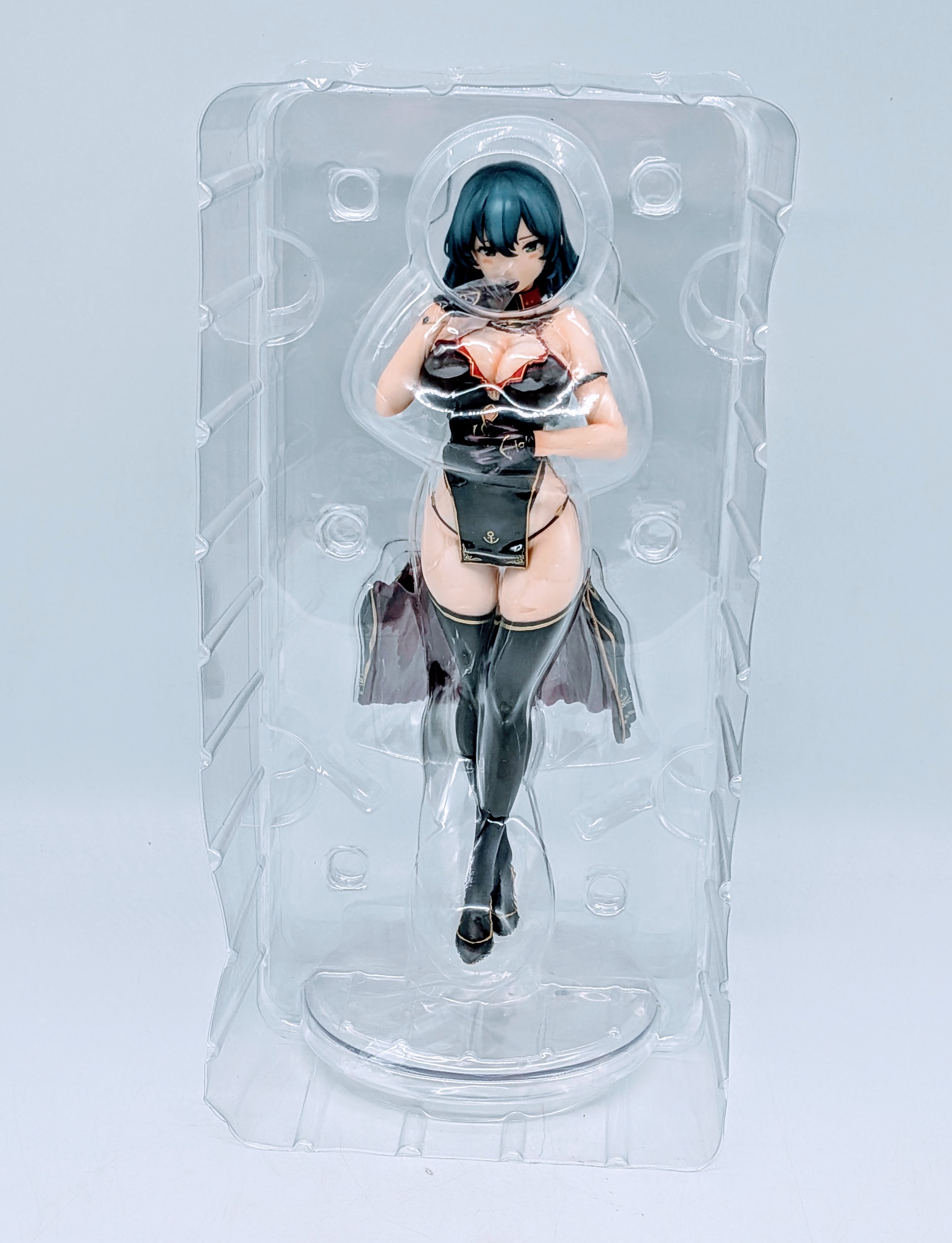 Cattleya figure and base inside the blister tray