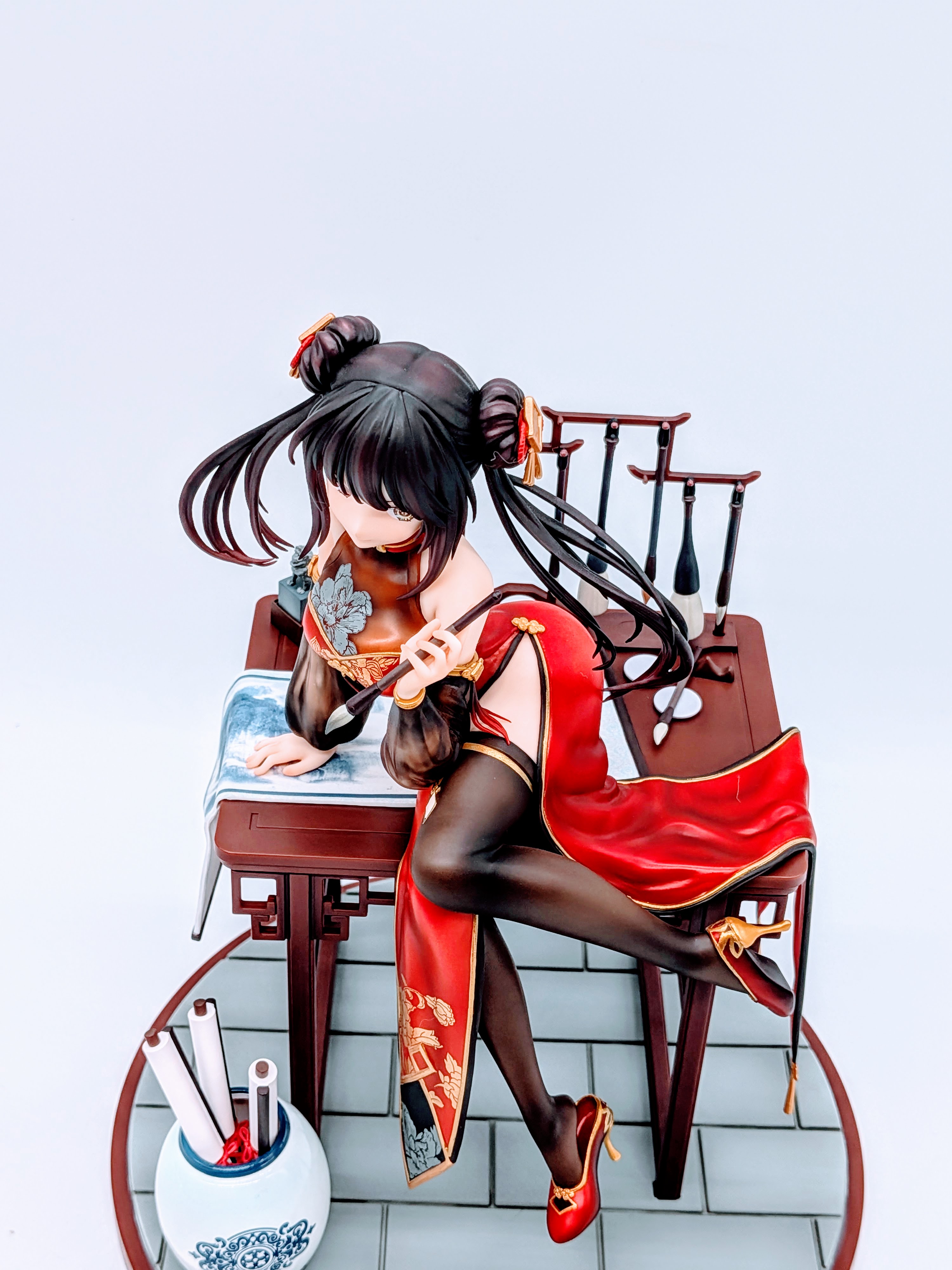 Front close-up of Kurumi Tokisaki upper body, cleavage and calligraphy brush