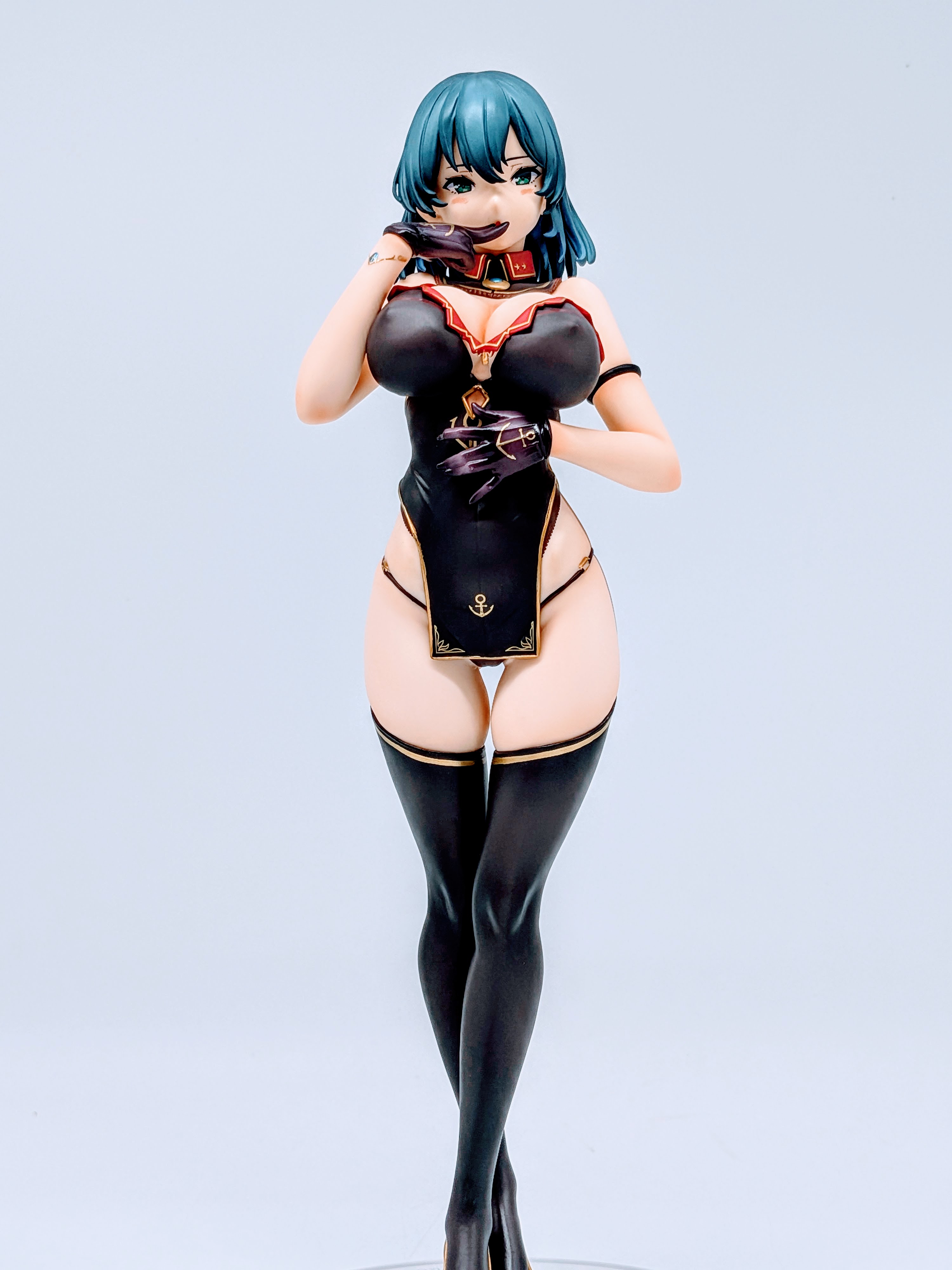 Close-up of Cattleya cleavage, medals and naval uniform details