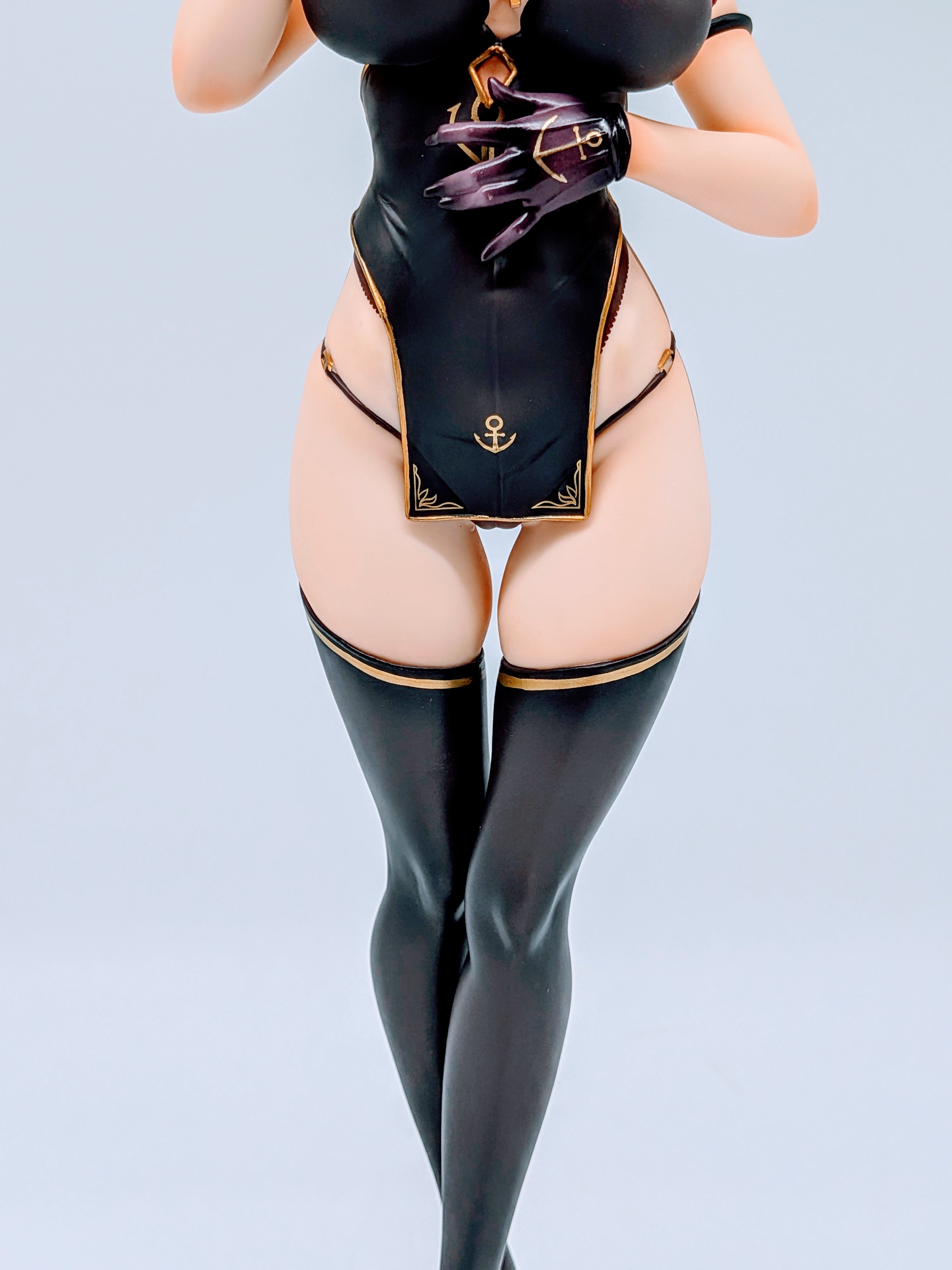 Front close-up of Cattleya hips, short skirt and thighs