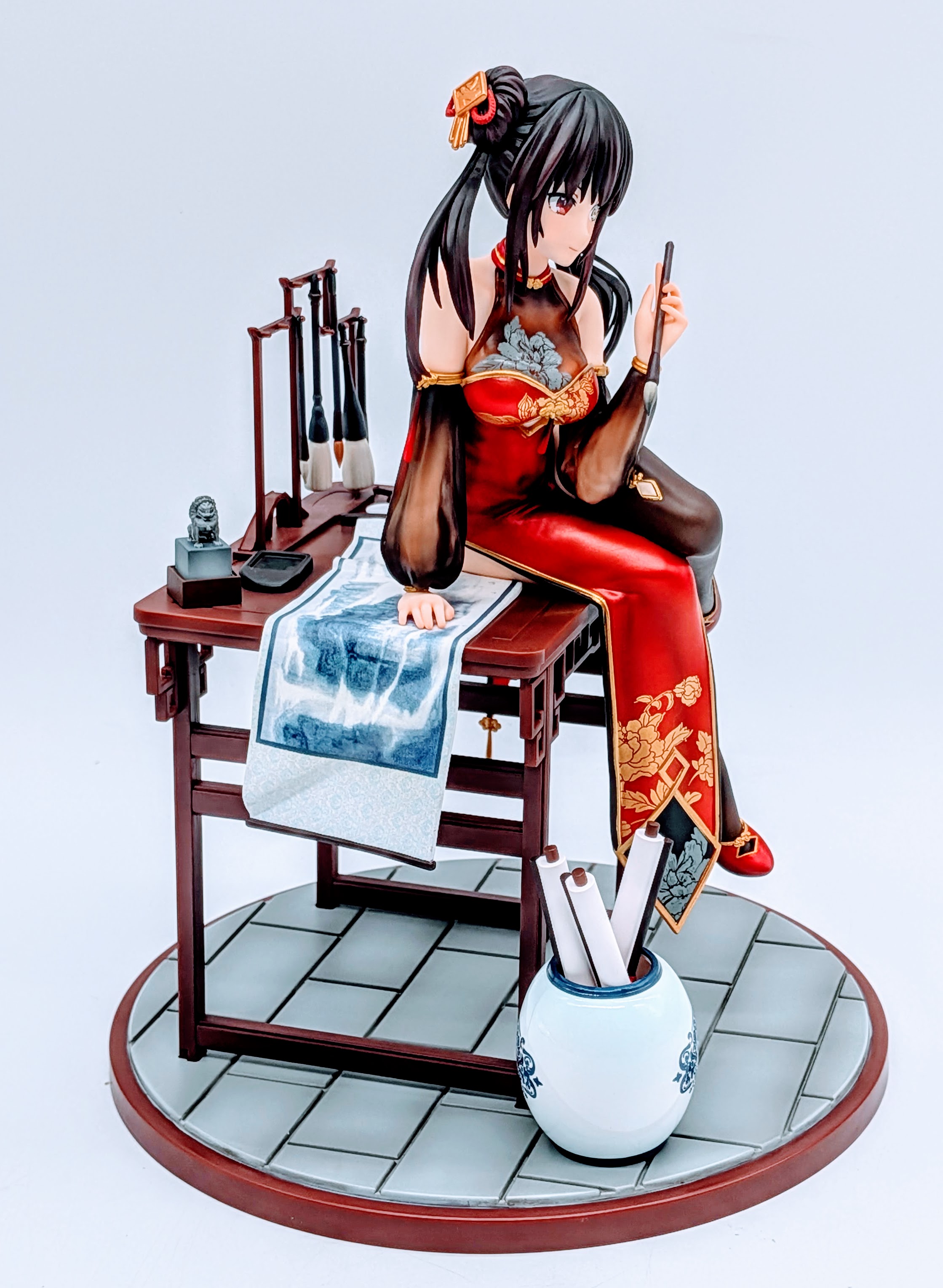 Side full-body view of Kurumi Tokisaki Calligraphic Beauty Ver. sitting at the desk