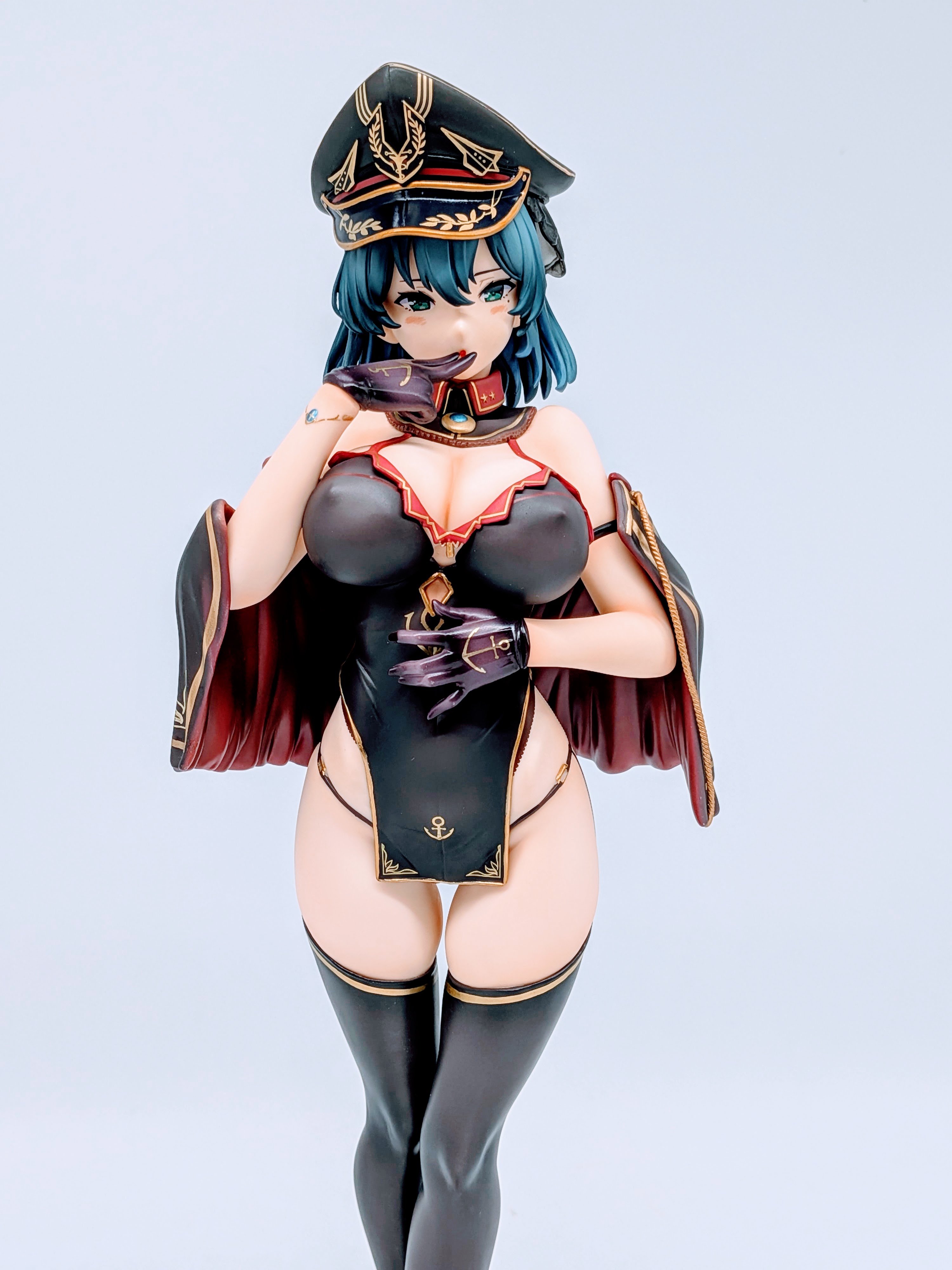 Close-up of Cattleya legs, shoes and figure base