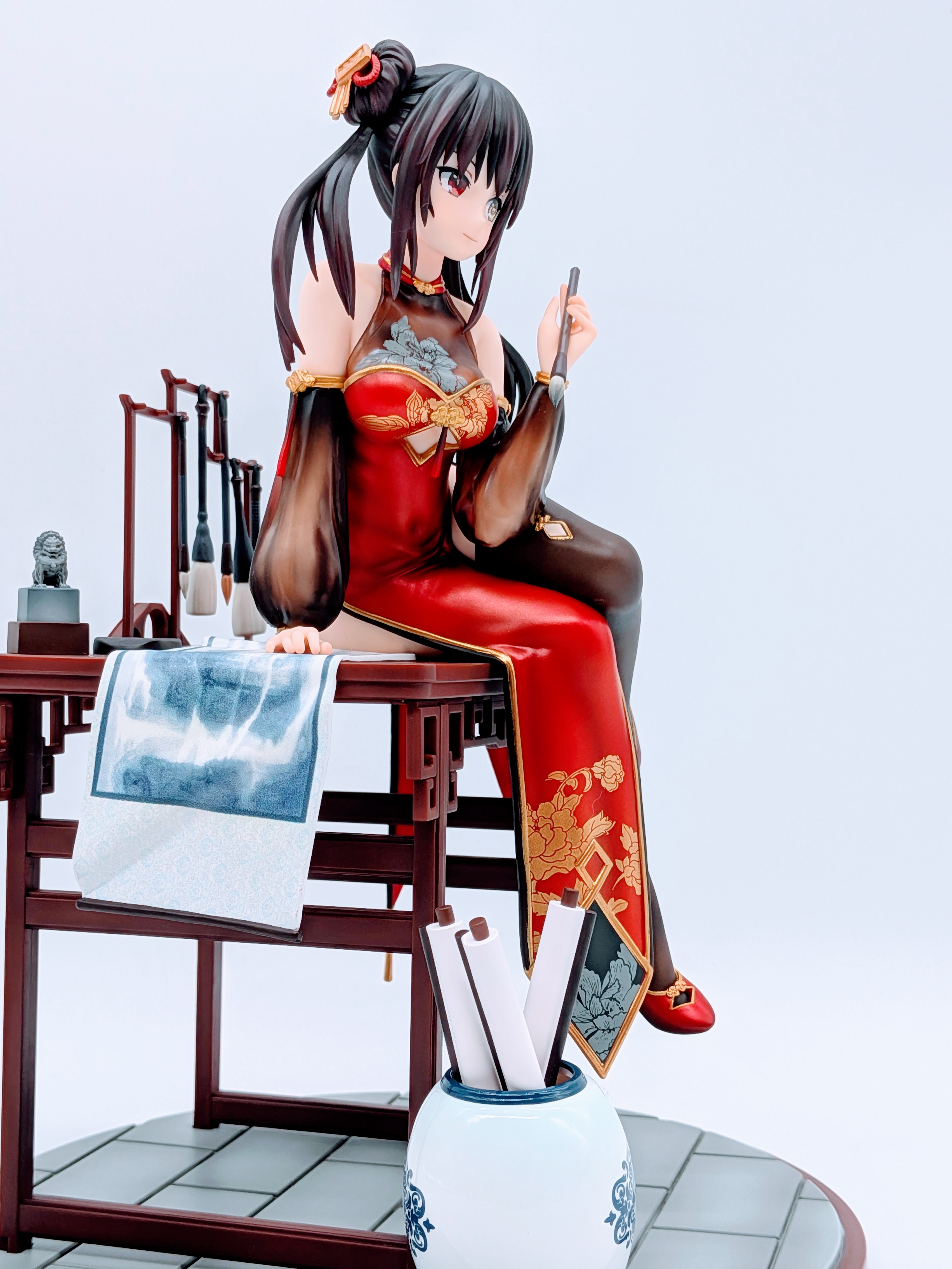 Side close-up of Kurumi Tokisaki legs crossing under the desk