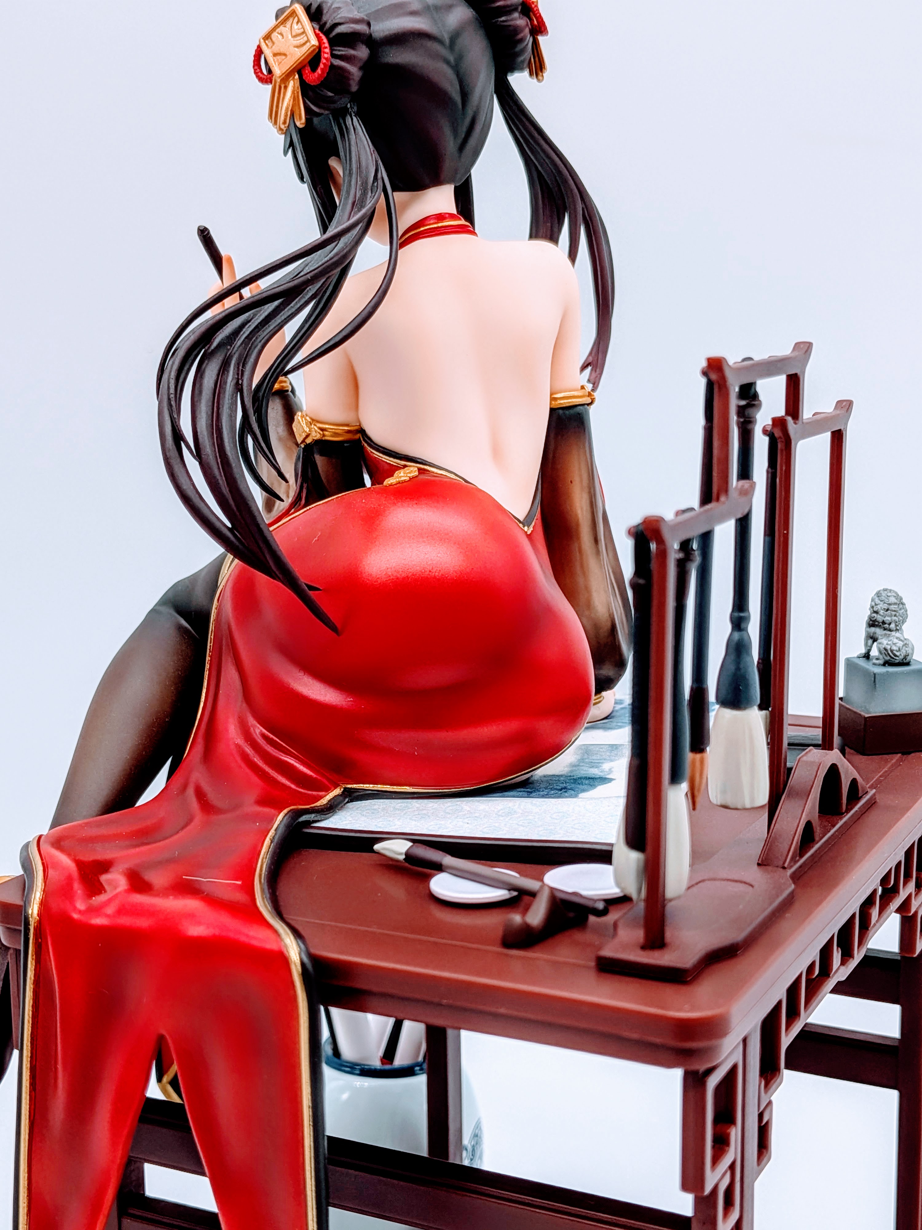 Rear low-angle close-up of Kurumi Tokisaki hips and upper thighs