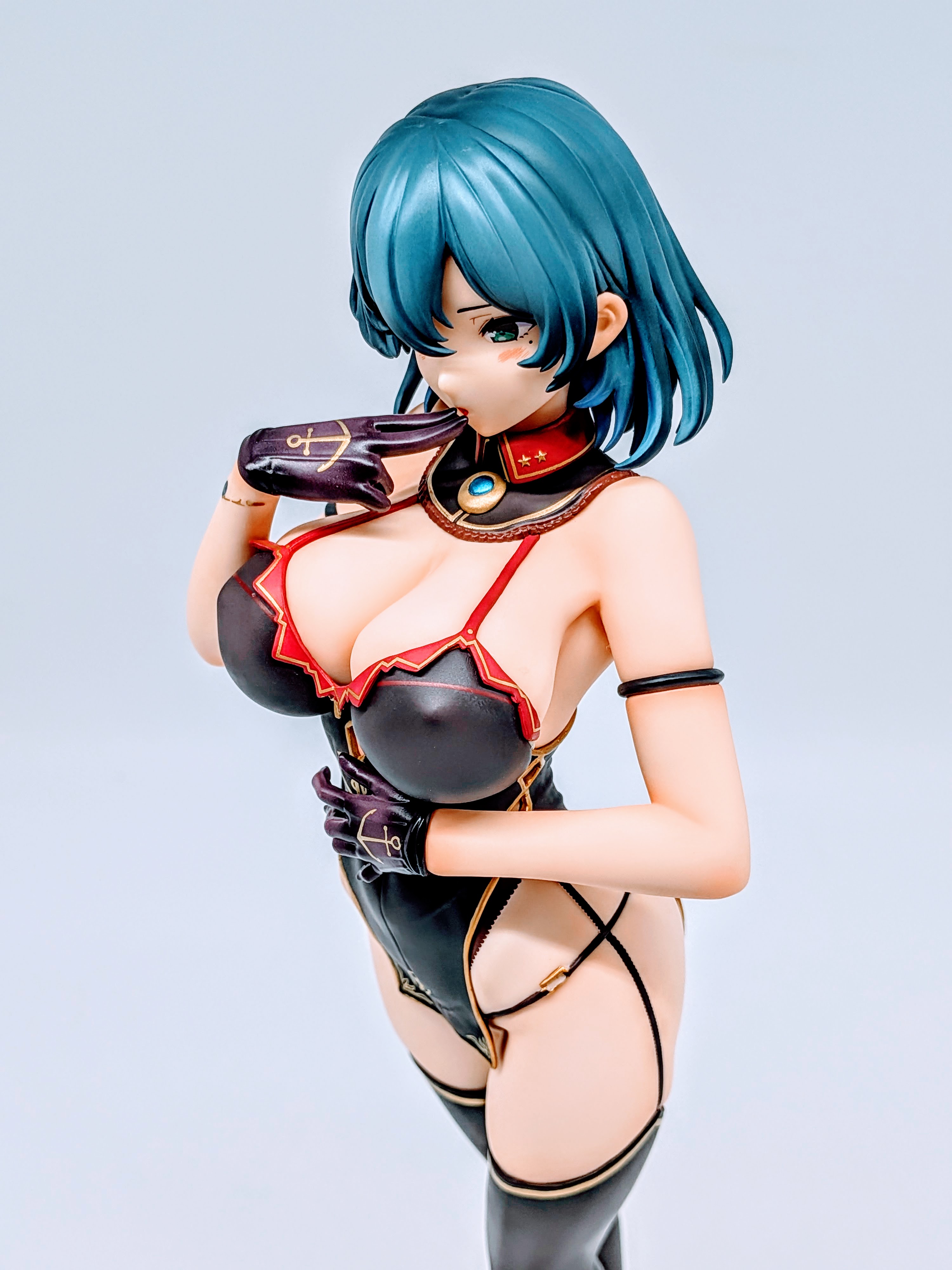 Side close-up of Cattleya thighs, stockings and heels