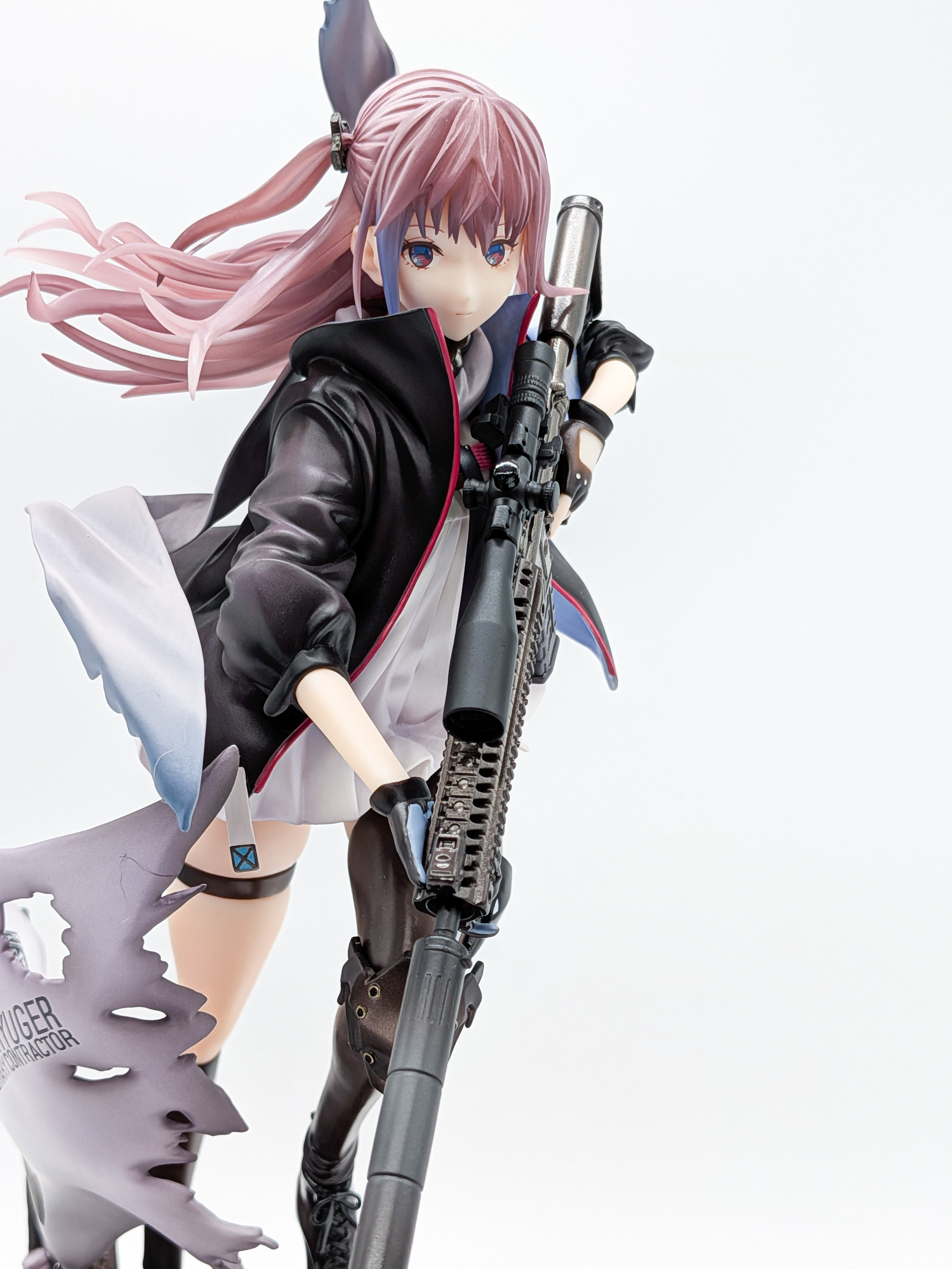 Close-up of ST AR-15 rifle and torso from side angle