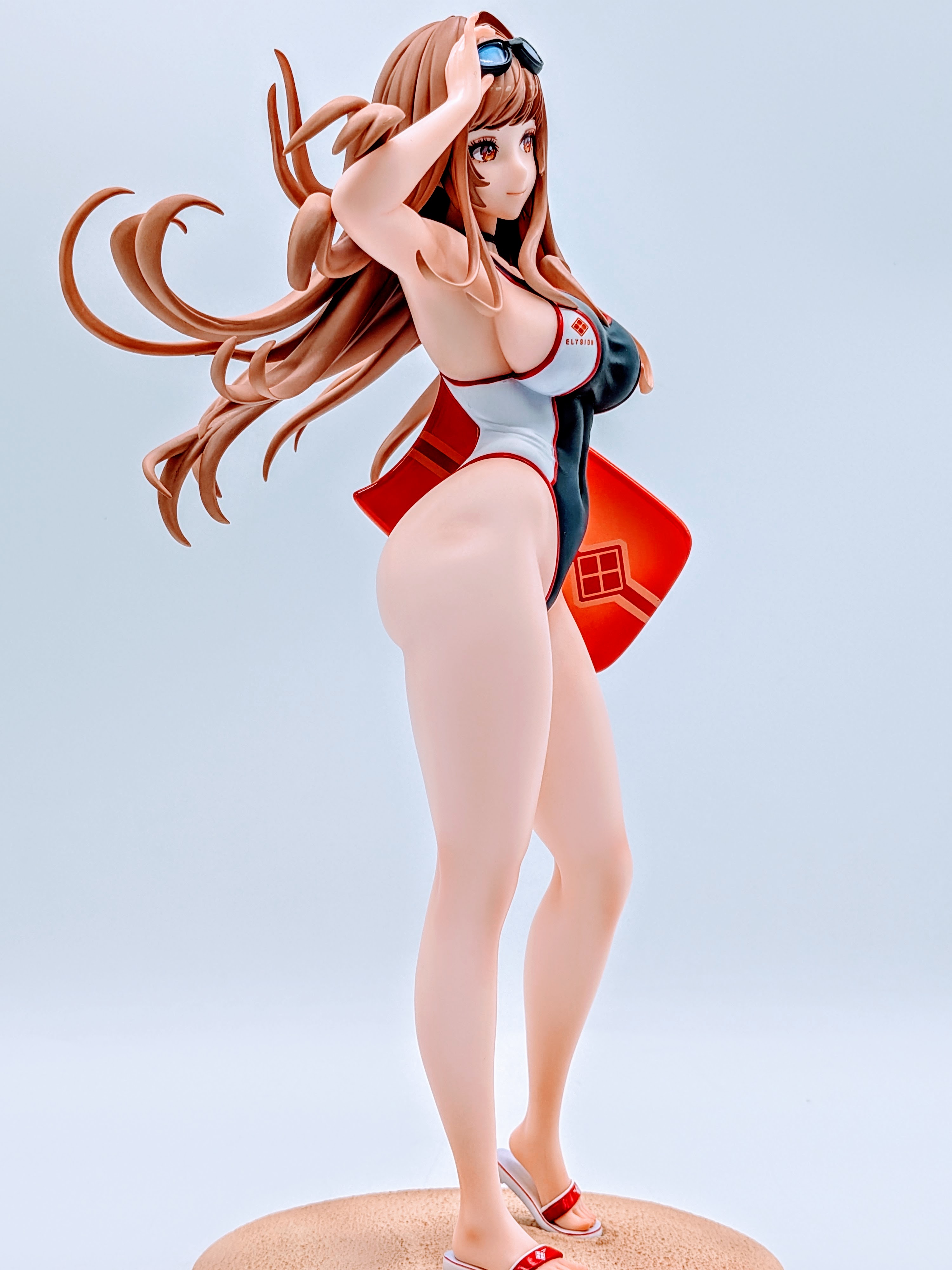 Side close-up of Rapi Classic Vacation figure swimsuit and thigh