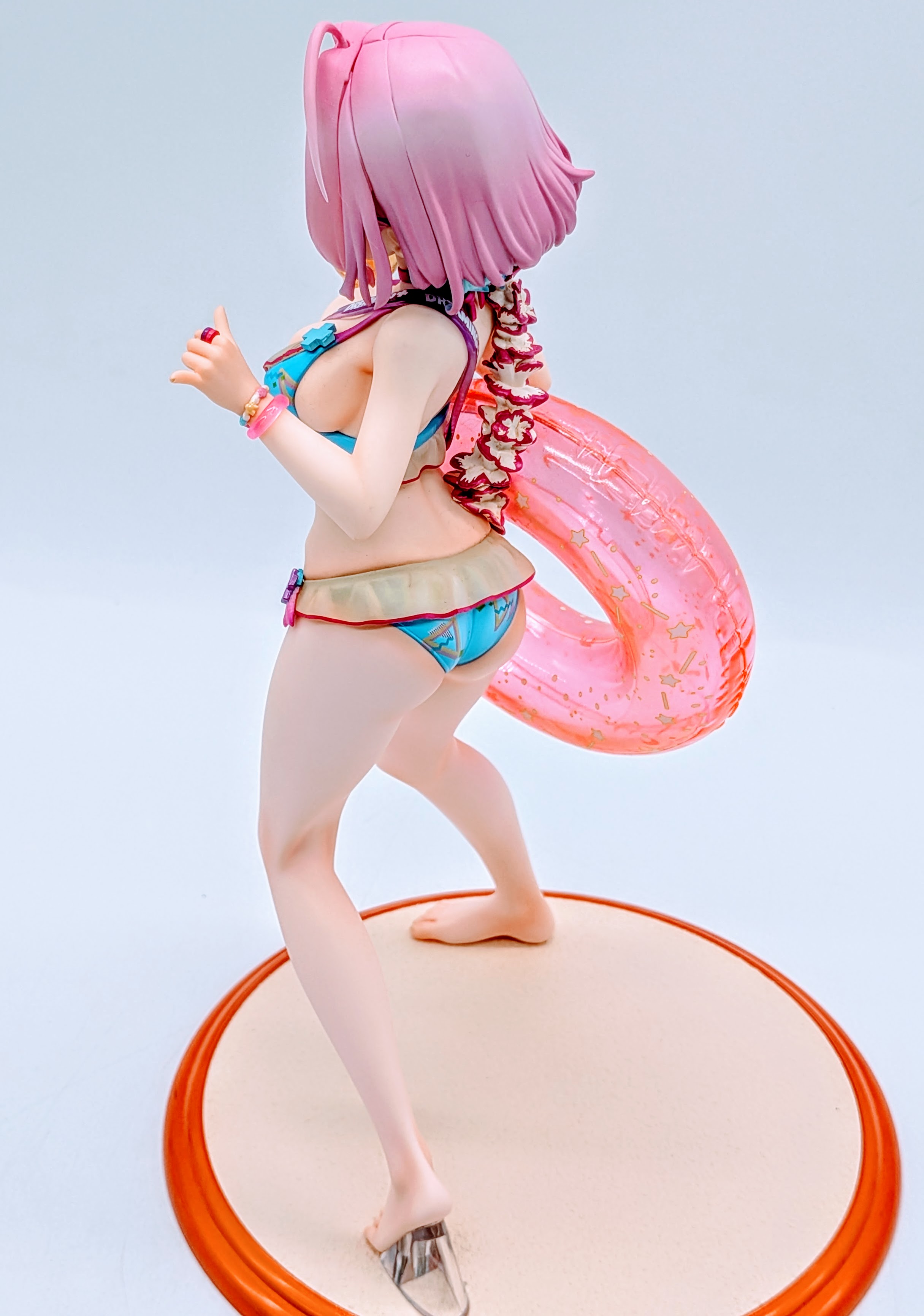 Back-side full-body view of Yumemi Riamu swimsuit figure