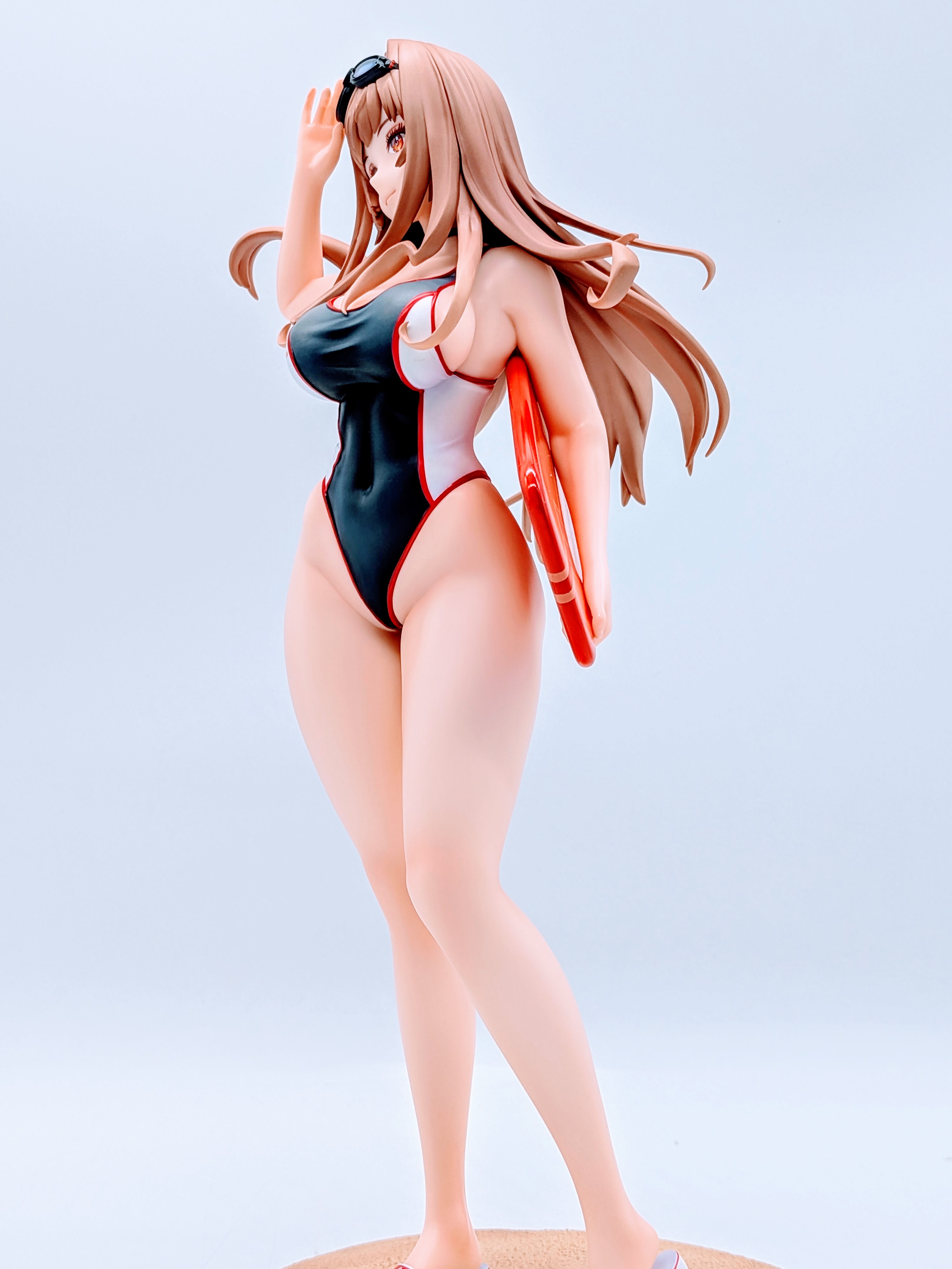Full side angle of Rapi Classic Vacation figure with float board
