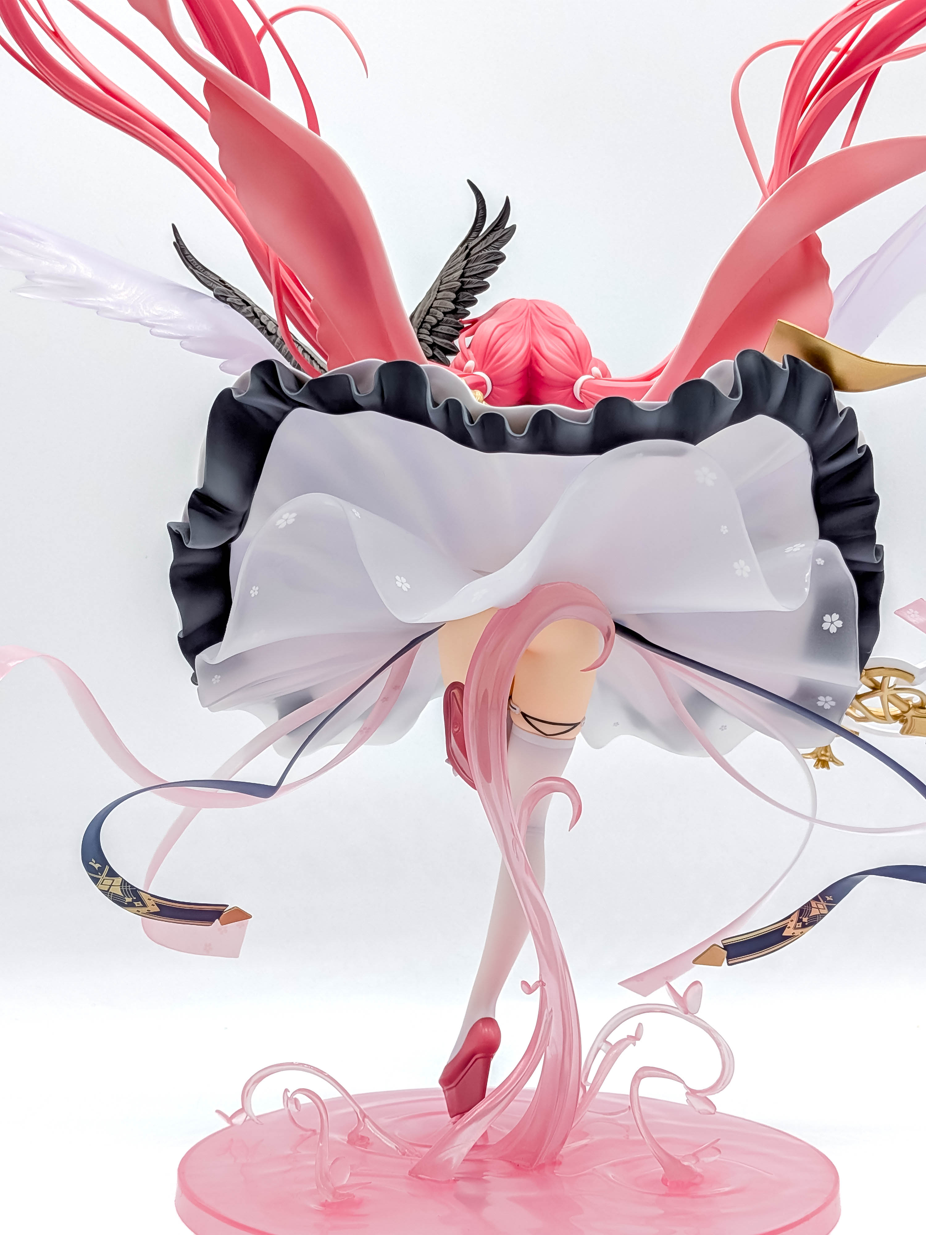 Perseus figure low rear full view with skirt and flowing hair
