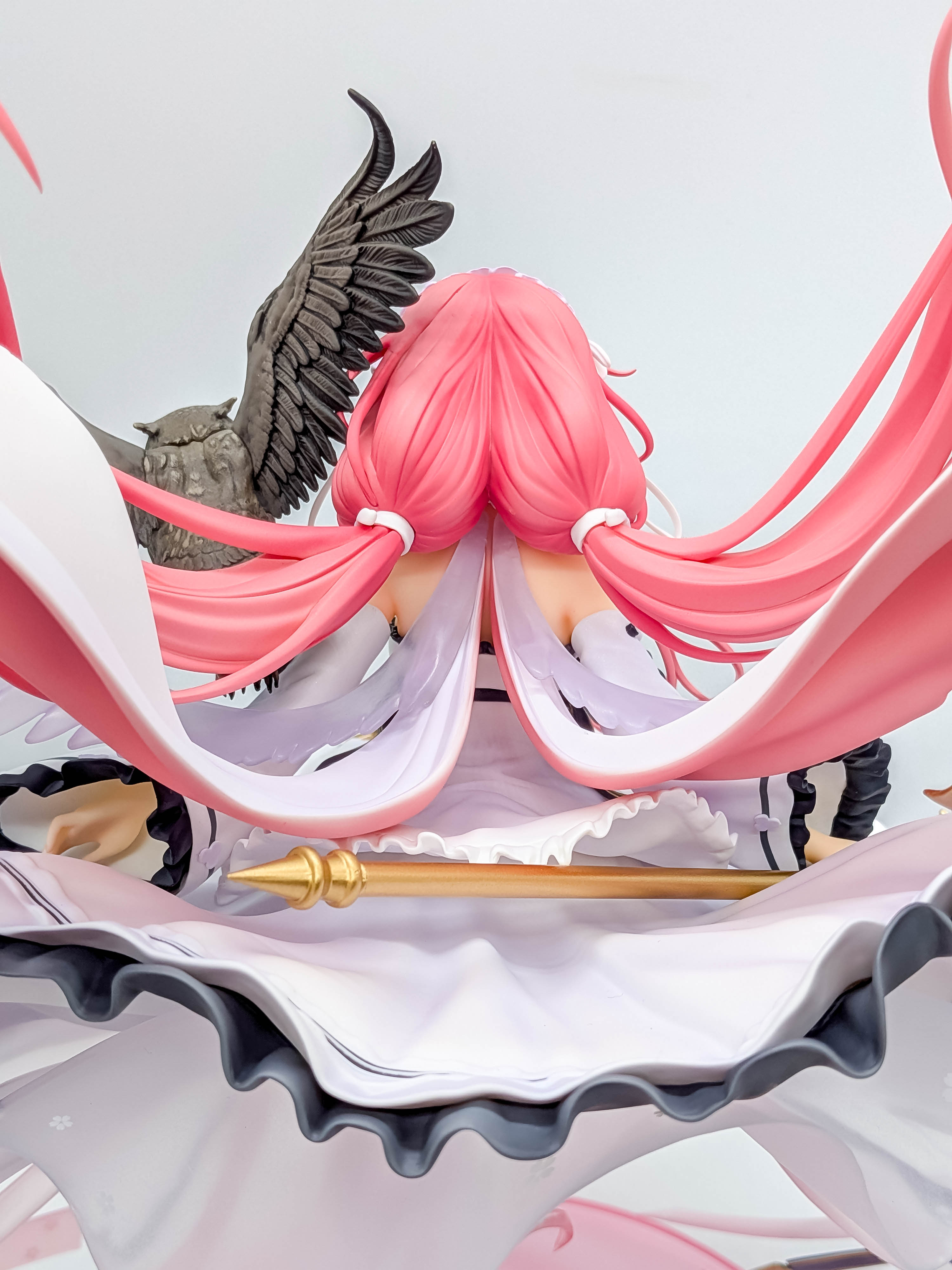 Perseus figure rear hair dress and owl detail
