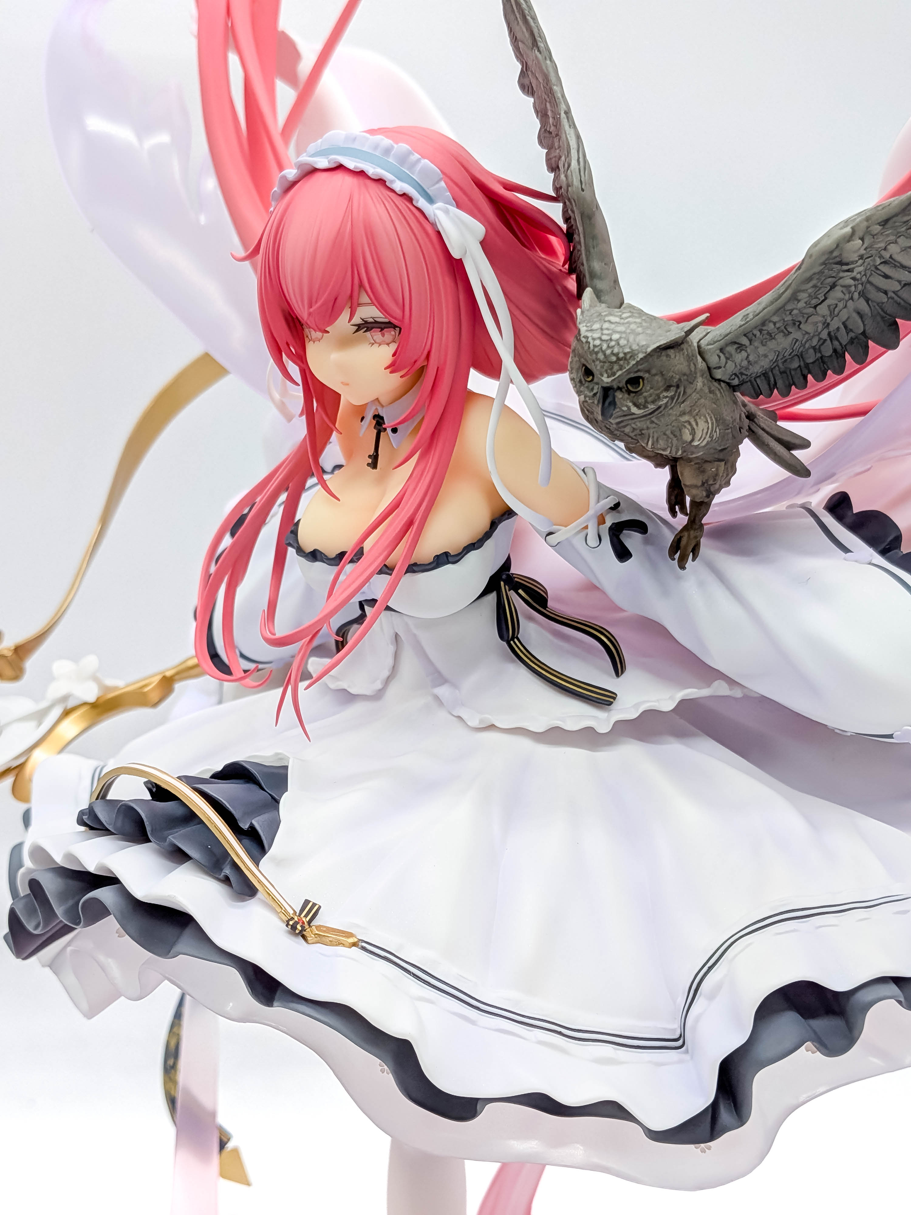 Perseus figure side face dress and owl close-up