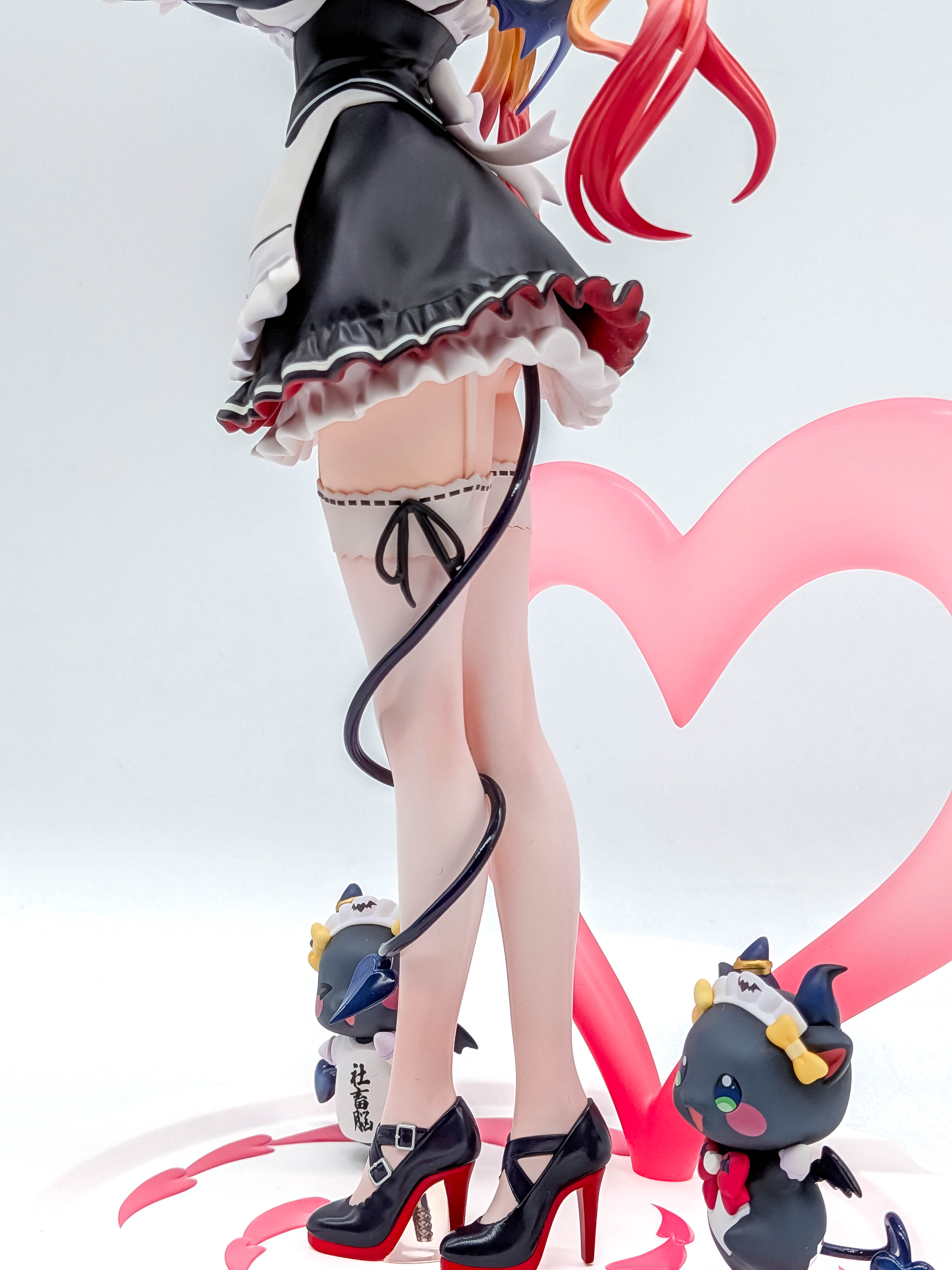 Yuzuki Choco figure legs heels mascots and heart backdrop