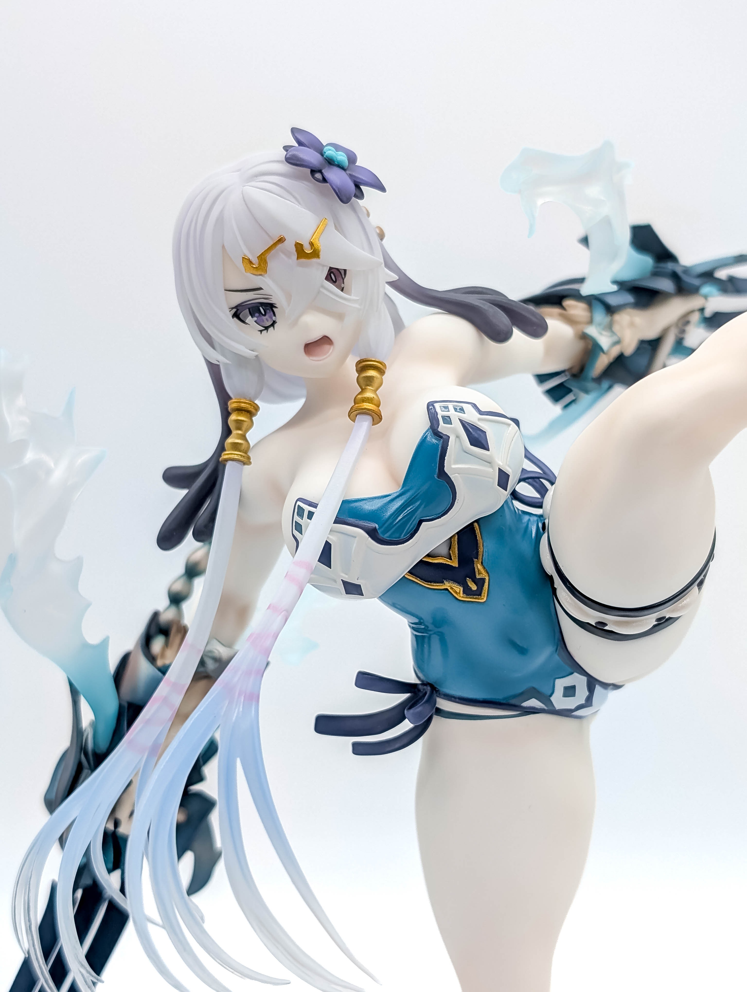 Lila Swimsuit Ver glossy swimsuit and raised-thigh close-up
