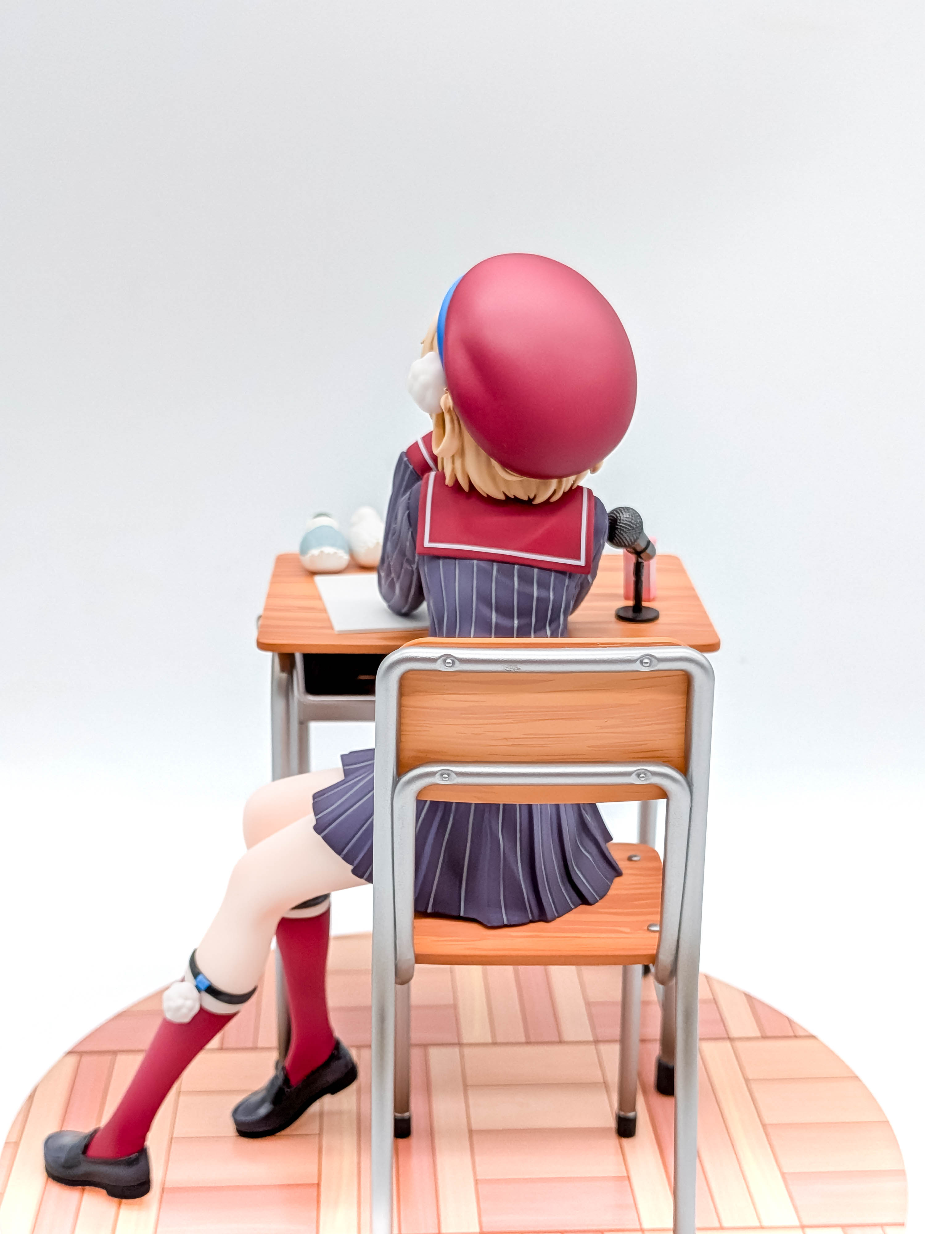 Shigure Ui figure rear seated pose and school chair close view
