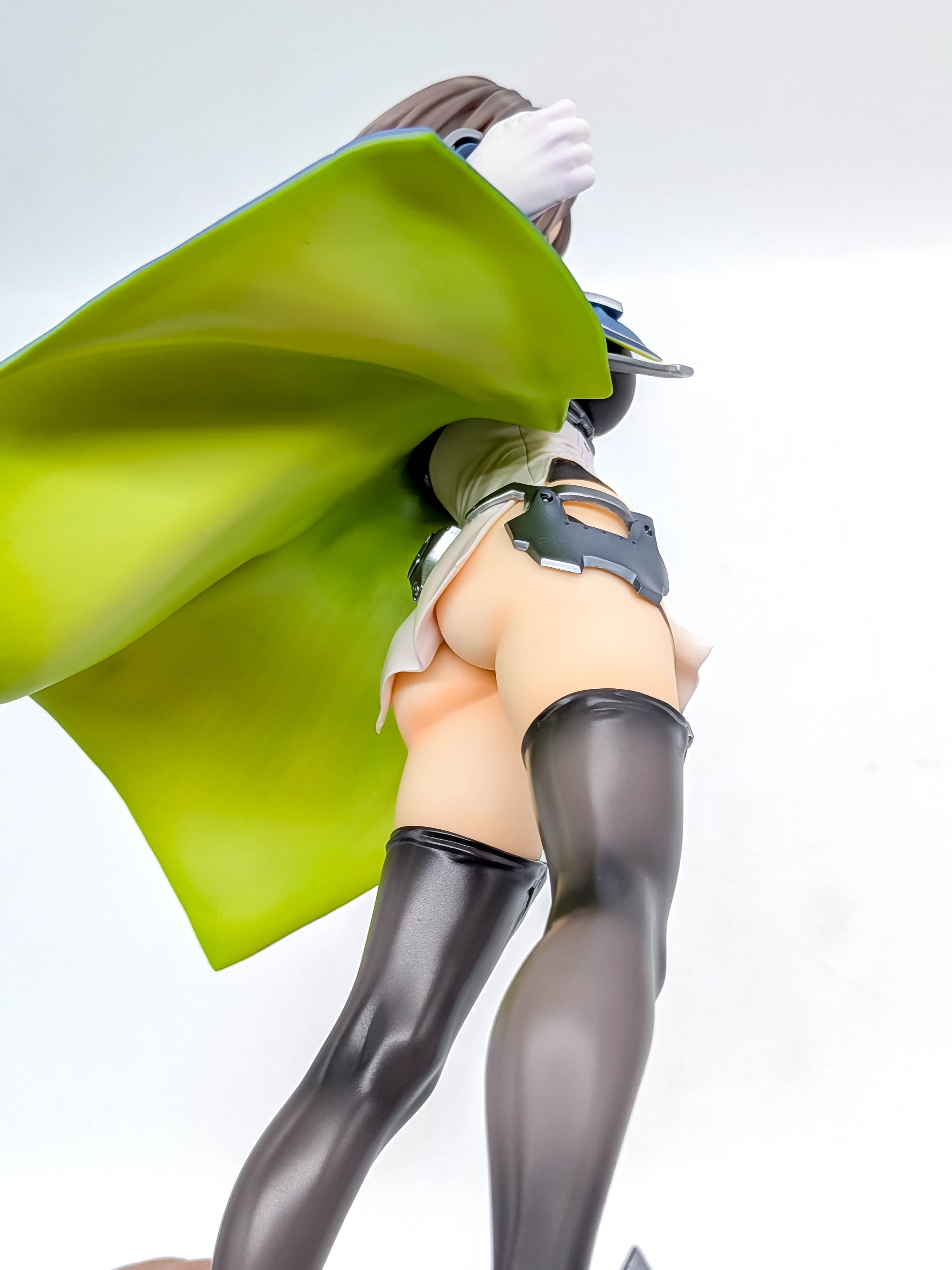 Baltimore figure low rear three-quarter view with coat and hip armor