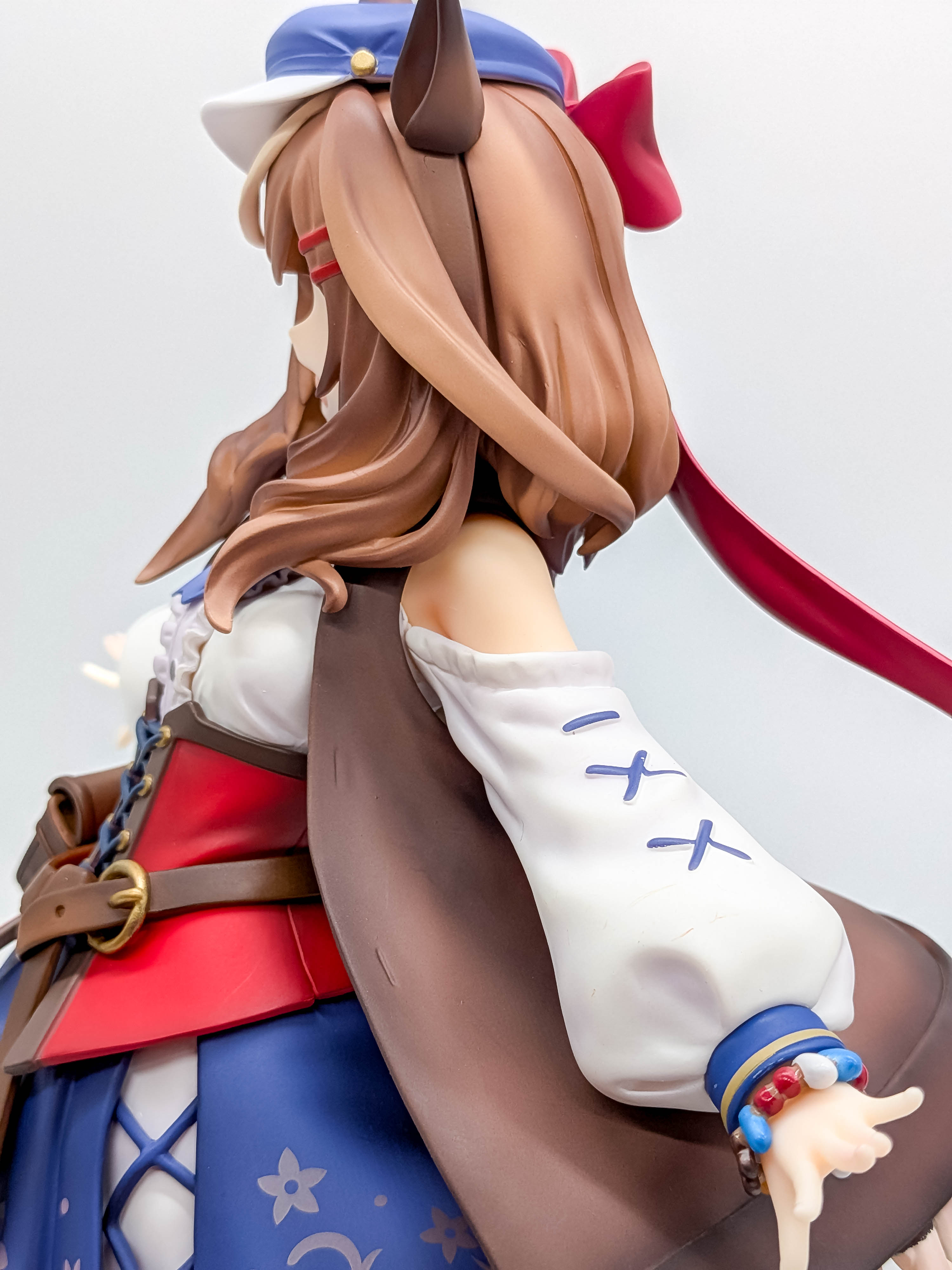 Matikanetannhauser figure sleeve bracelets hair and cape close-up