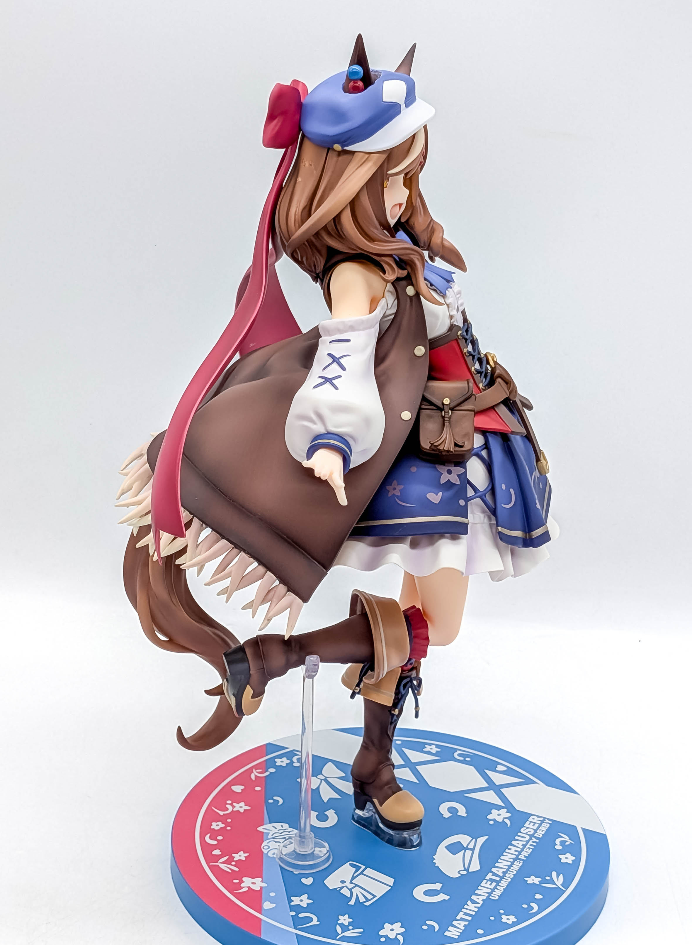 Matikanetannhauser figure full side view with cap cape and tail