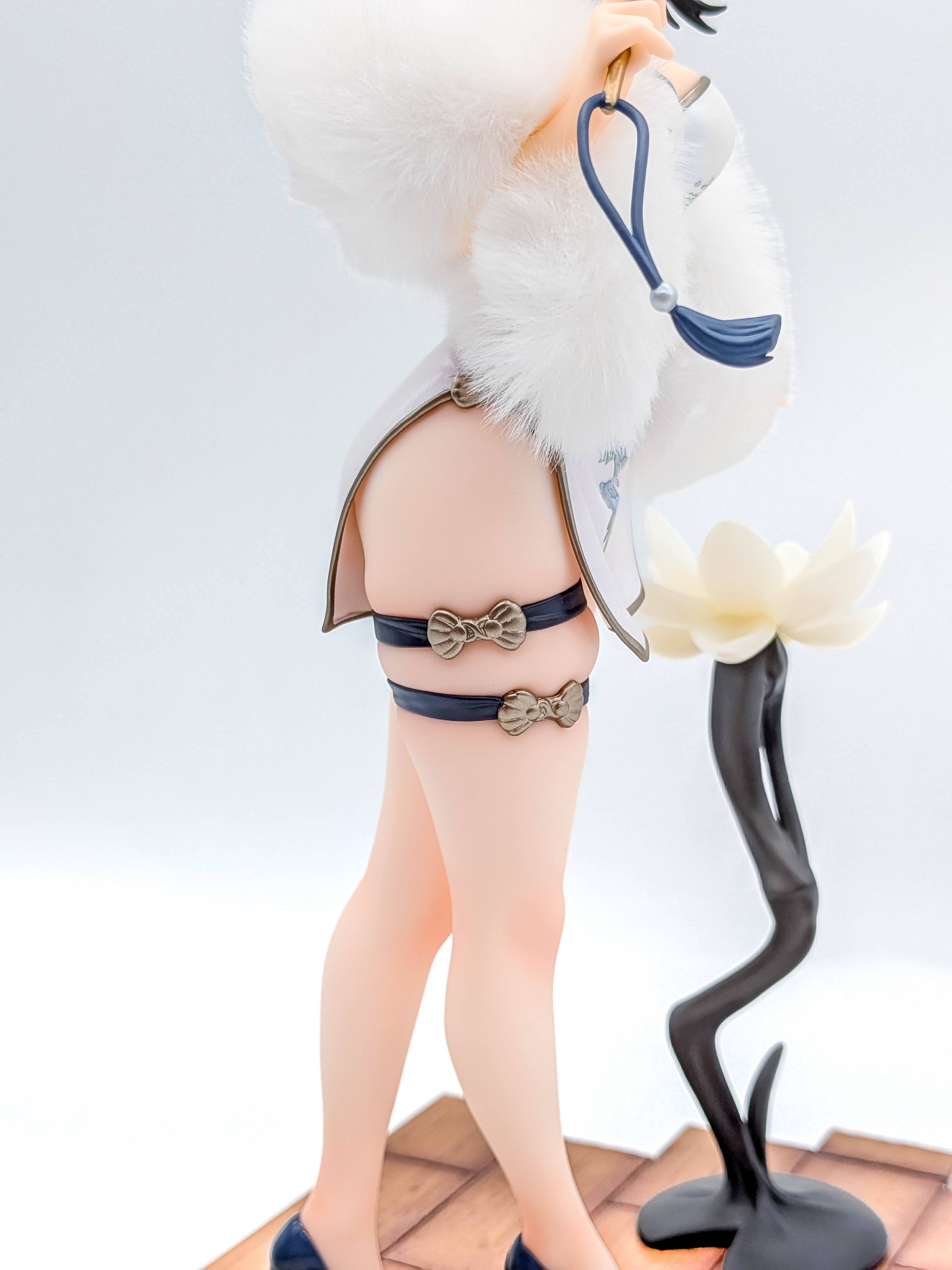 Rikka Takarada figure side dress slit and decorative leg bands detail