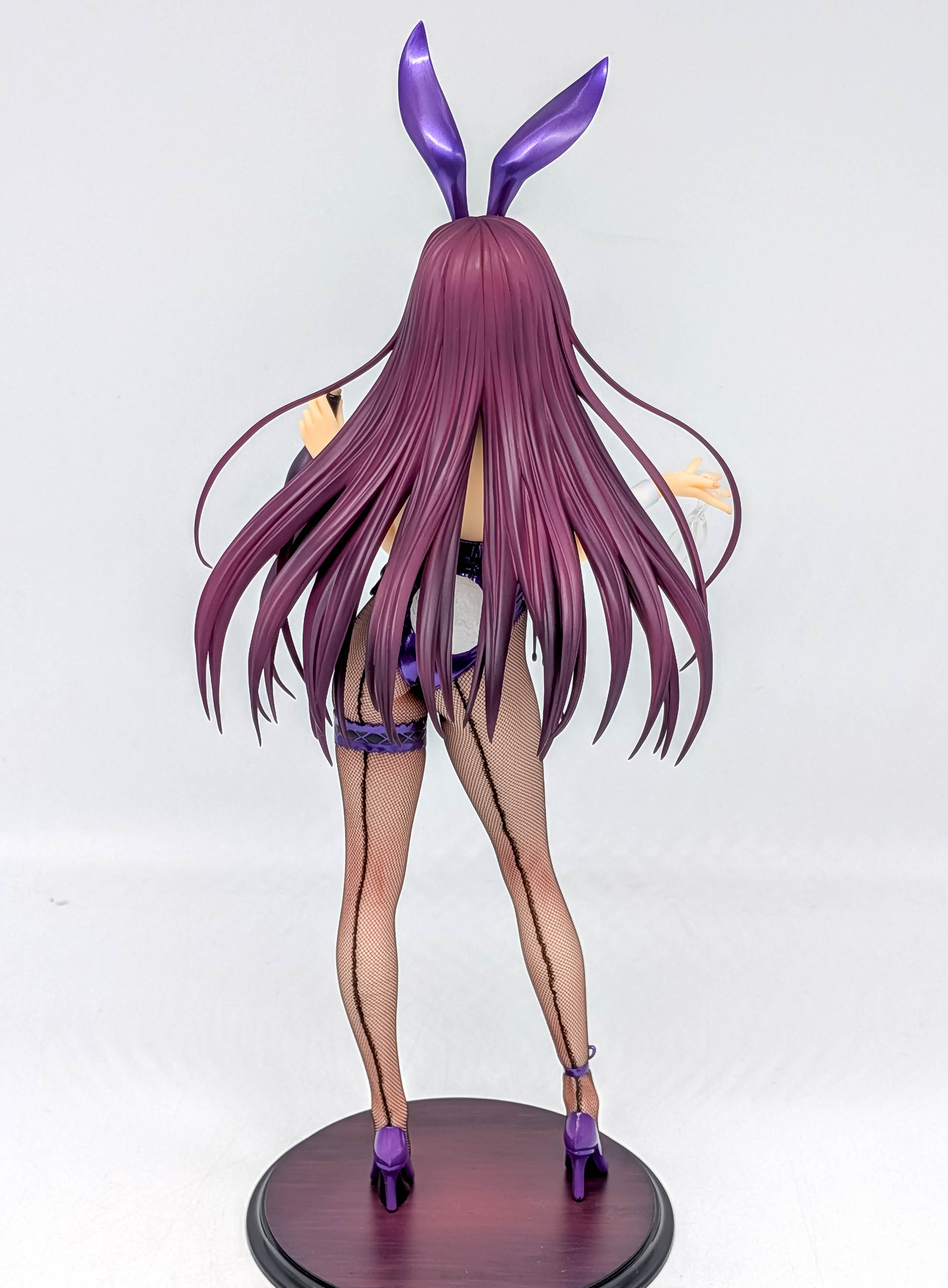 Full rear view with long layered purple hair