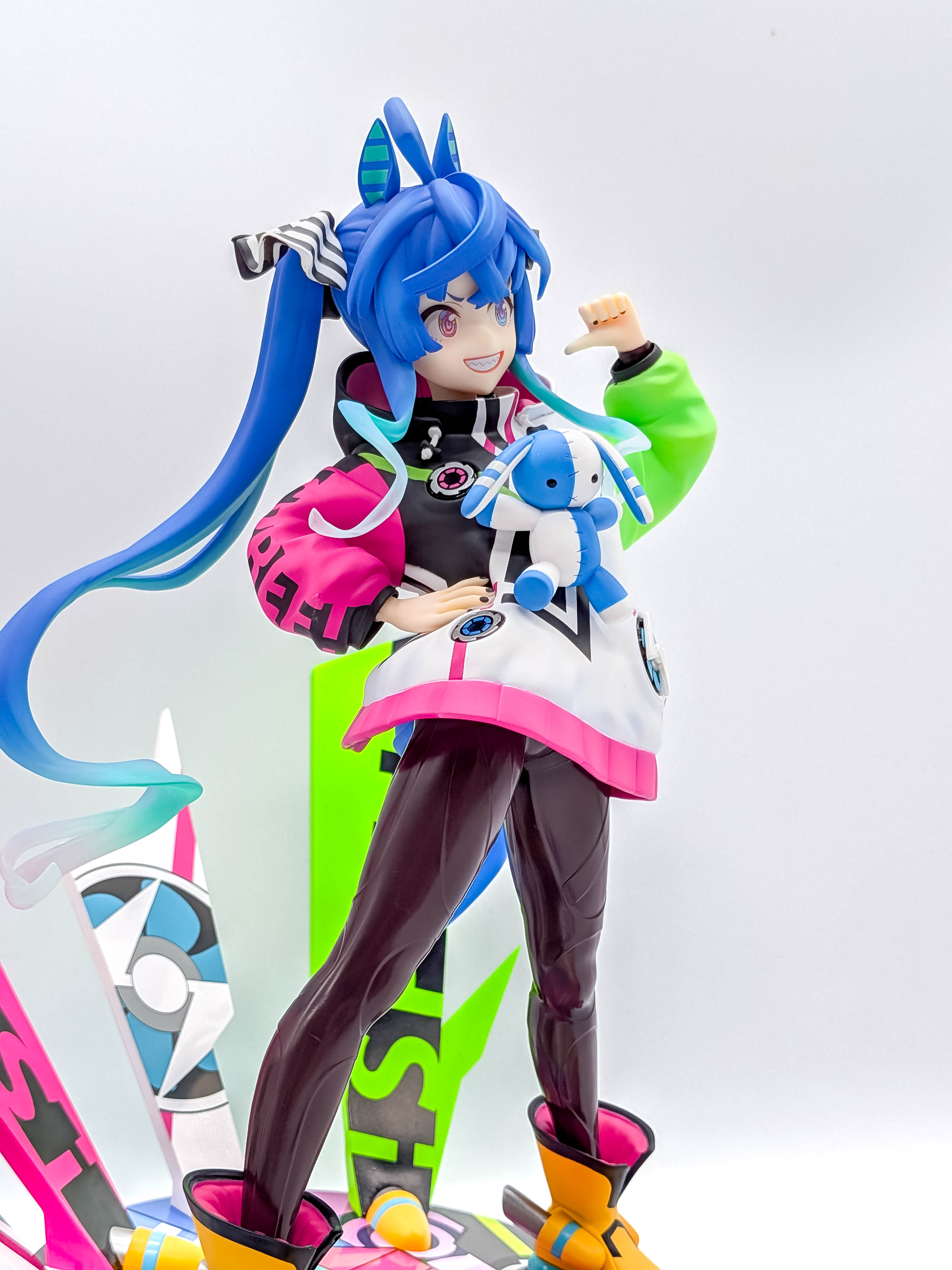 Twin Turbo figure three-quarter view with ears hair and plush mascot