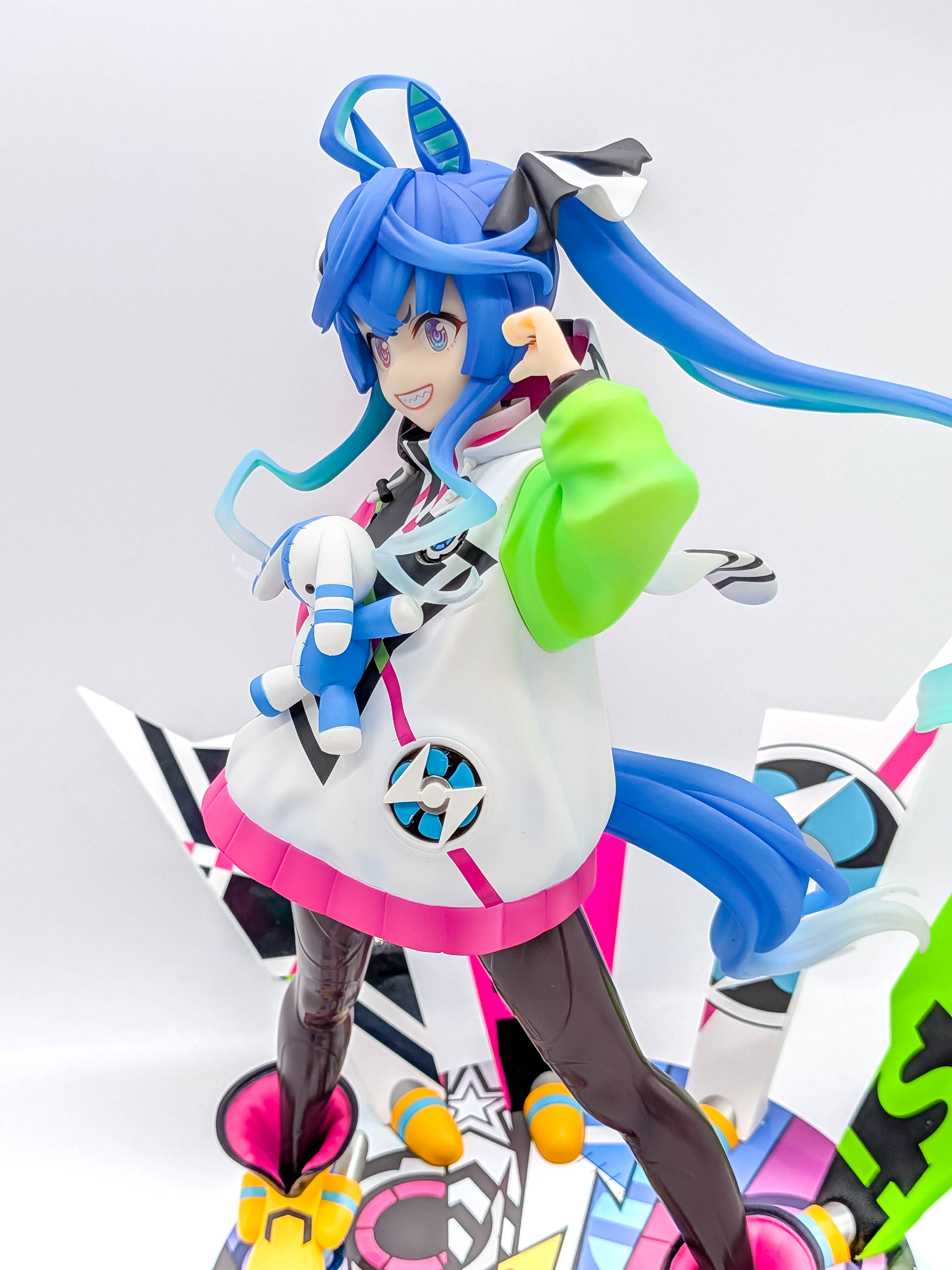 Twin Turbo figure side close-up with lime-green sleeve and flowing hair