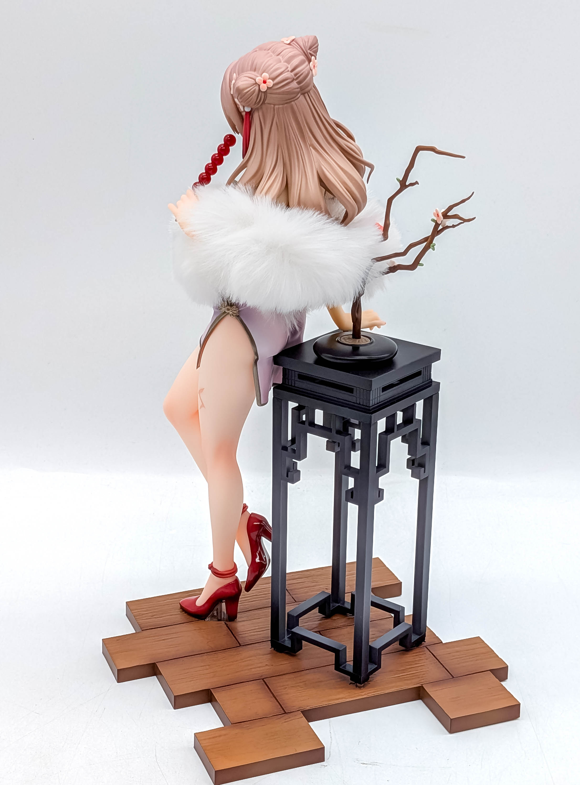 Yume Minami figure rear three-quarter full view with wooden base